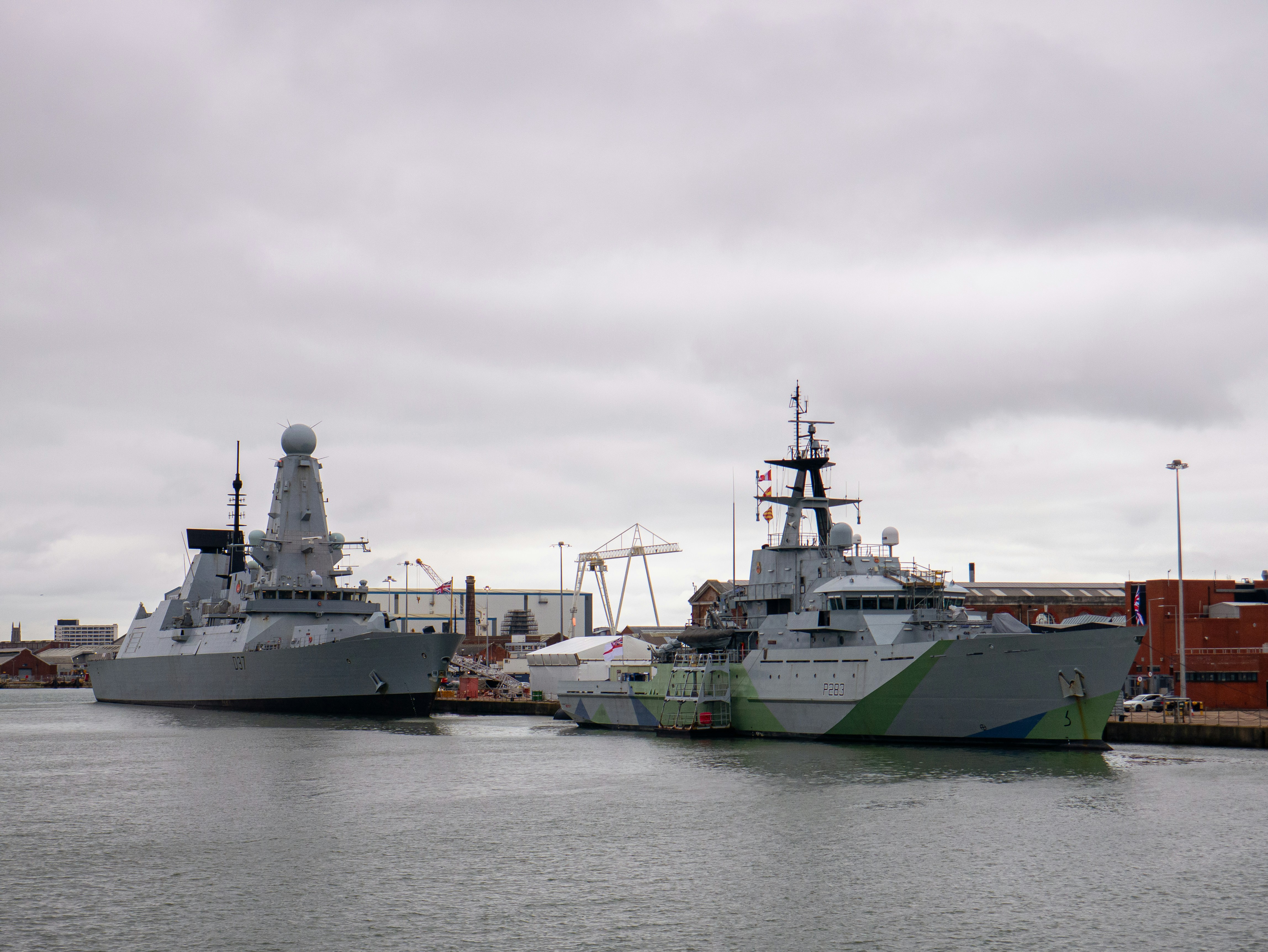 A couple of boats that are sitting in the water