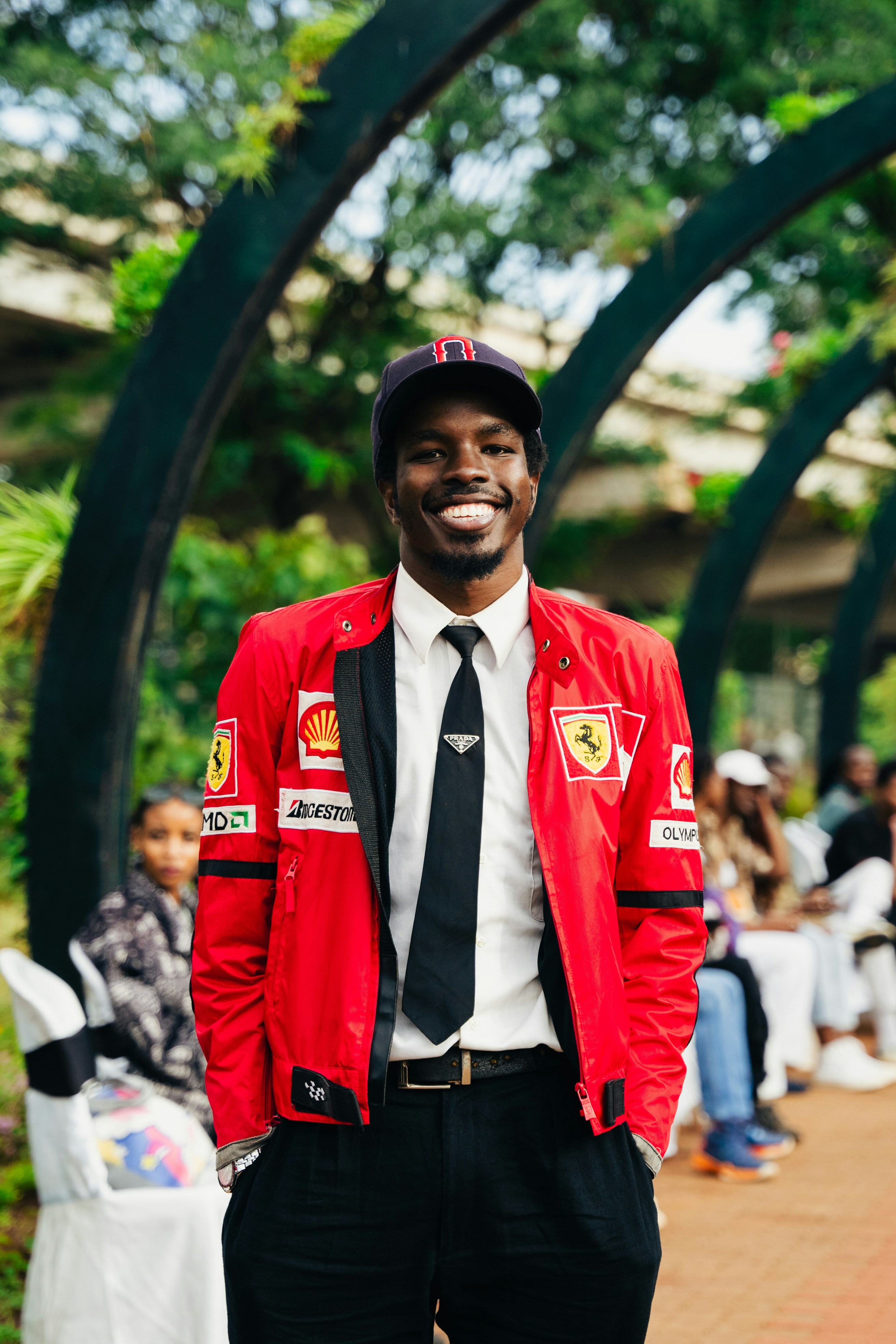 A man in a red jacket and black tie photo  Free People Image on Unsplash