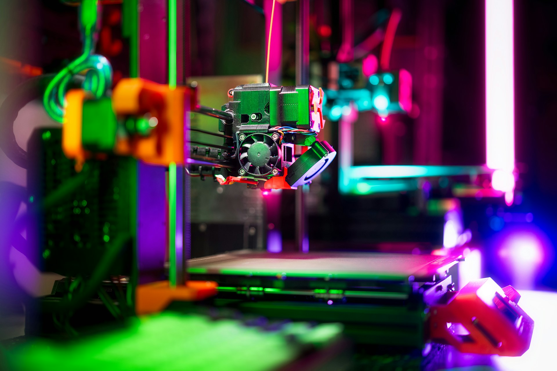 A close up of a machine with lights in the background