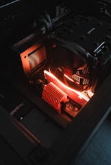 The inside of a computer case lit up at night