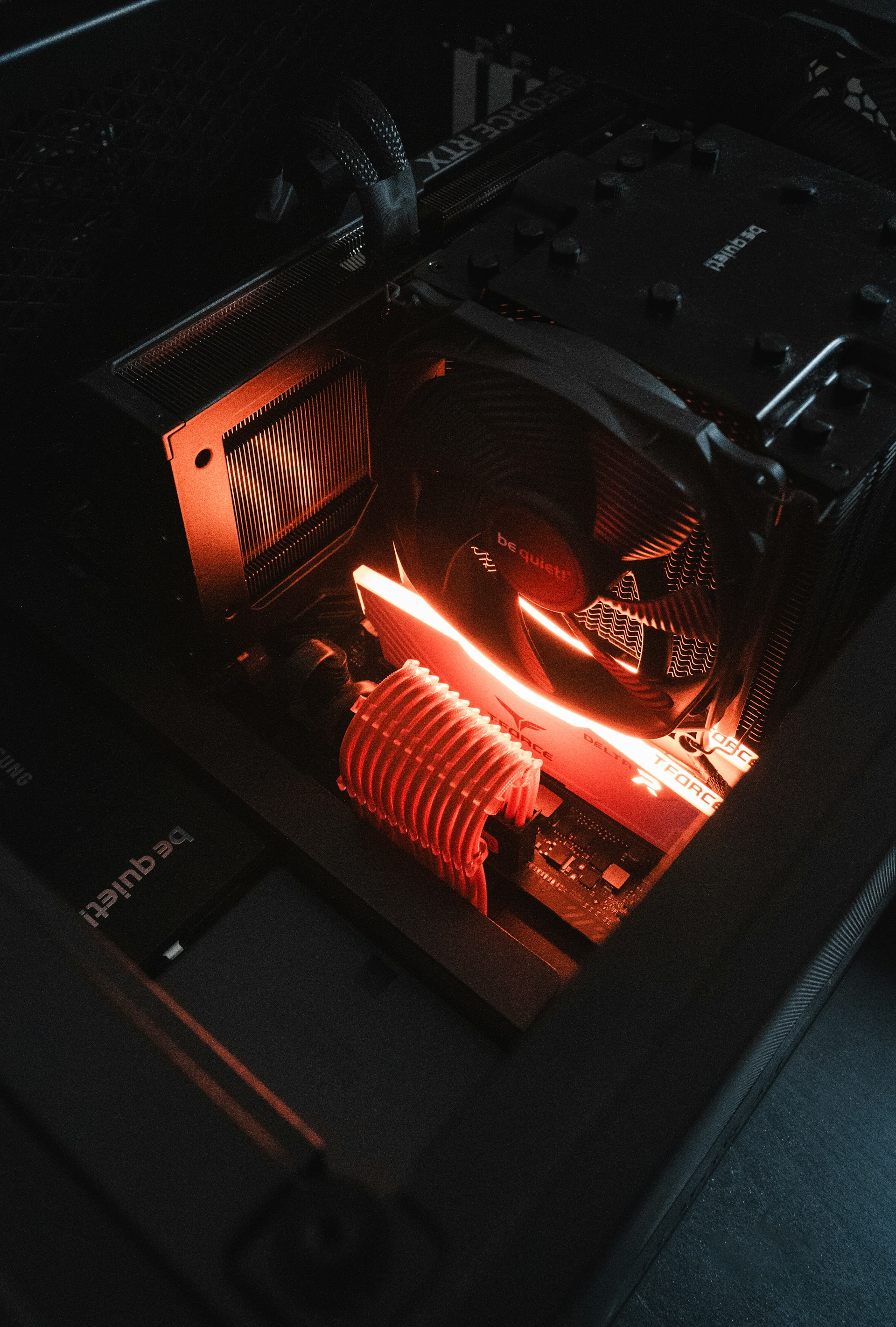 The inside of a computer case lit up at night