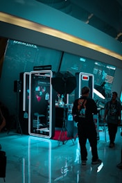 A group of people standing around a room