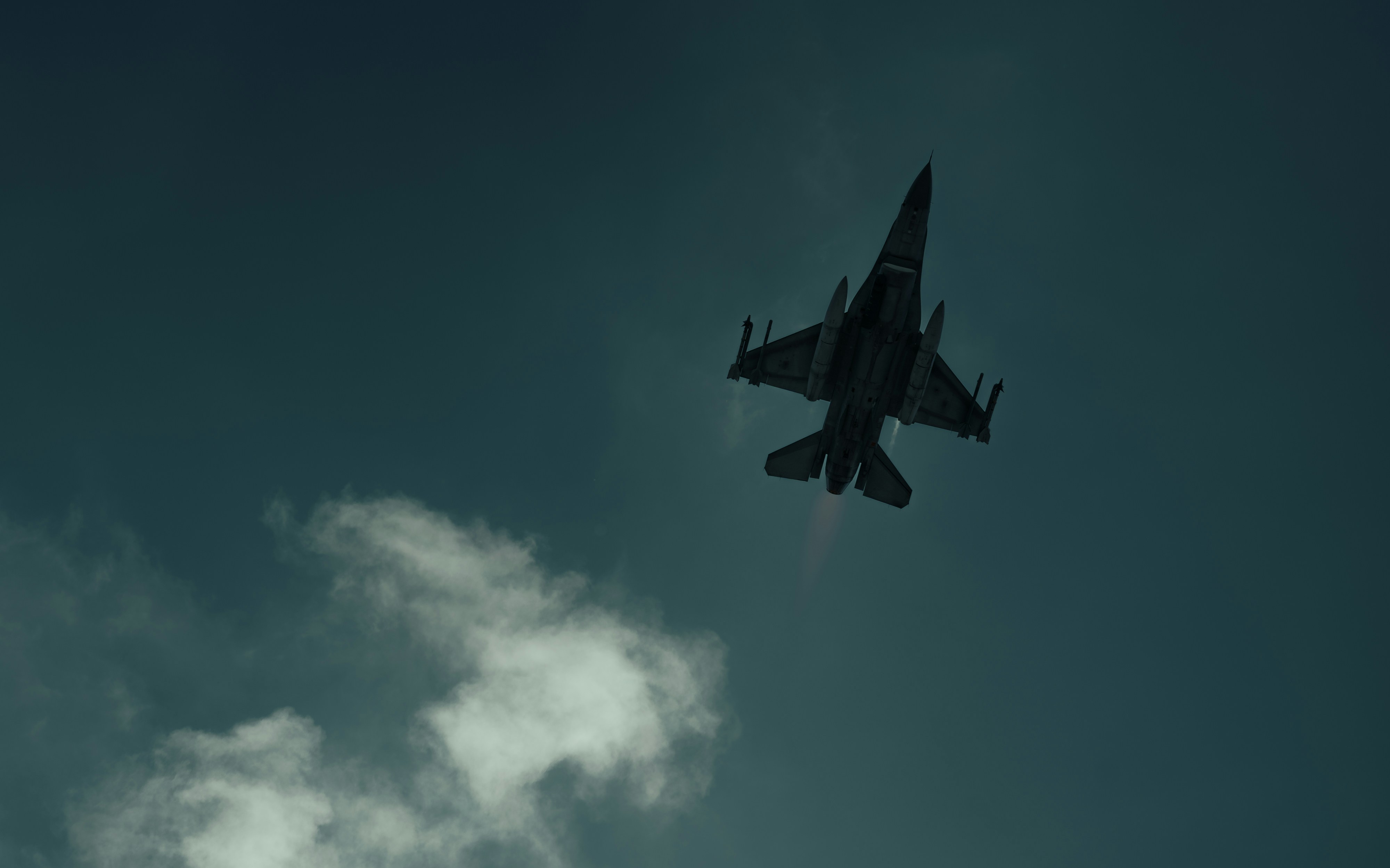 A fighter jet flying through a cloudy blue sky, 