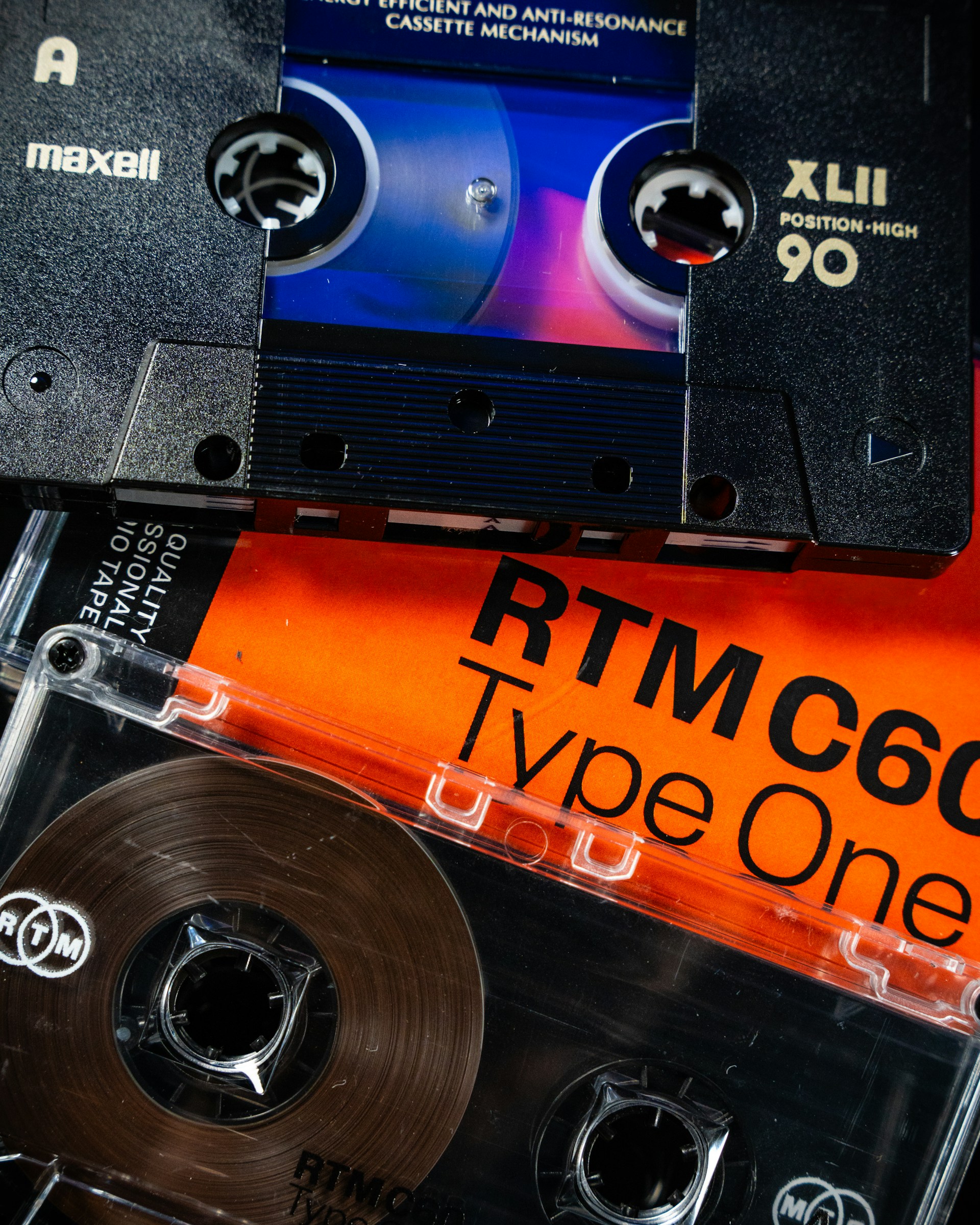 A couple of cassettes sitting on top of each other
