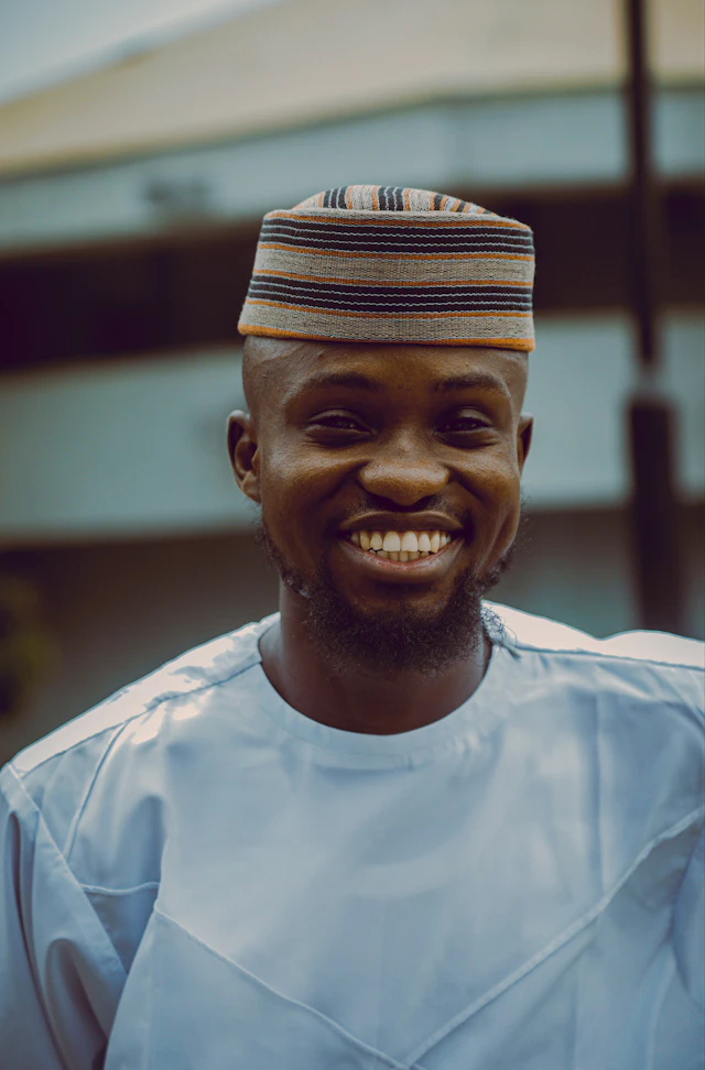 Portrait of a smiling man in a white shirt