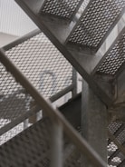 A close up of a metal stair case