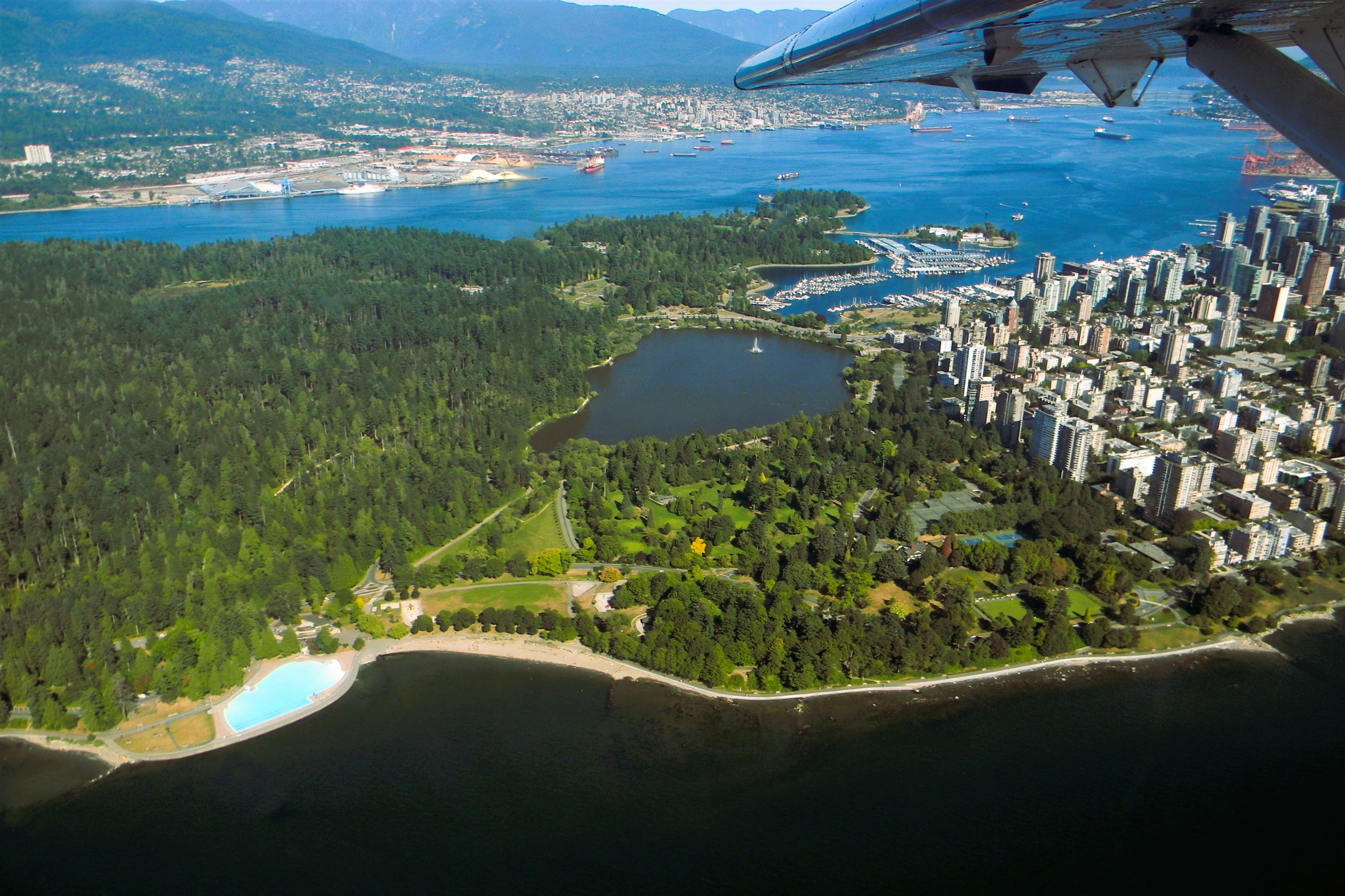 An aerial view of a city and a body of water photo – Free Stanley park ...