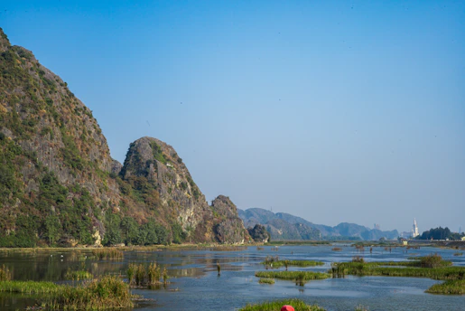 A person riding a boat on a body of water