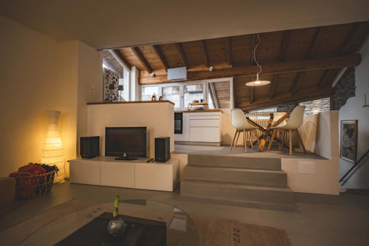 A living room filled with furniture and a flat screen TV