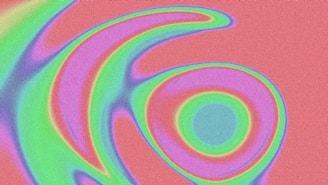 A picture of a spiral design on a pink background