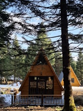 A small wooden cabin in the woods