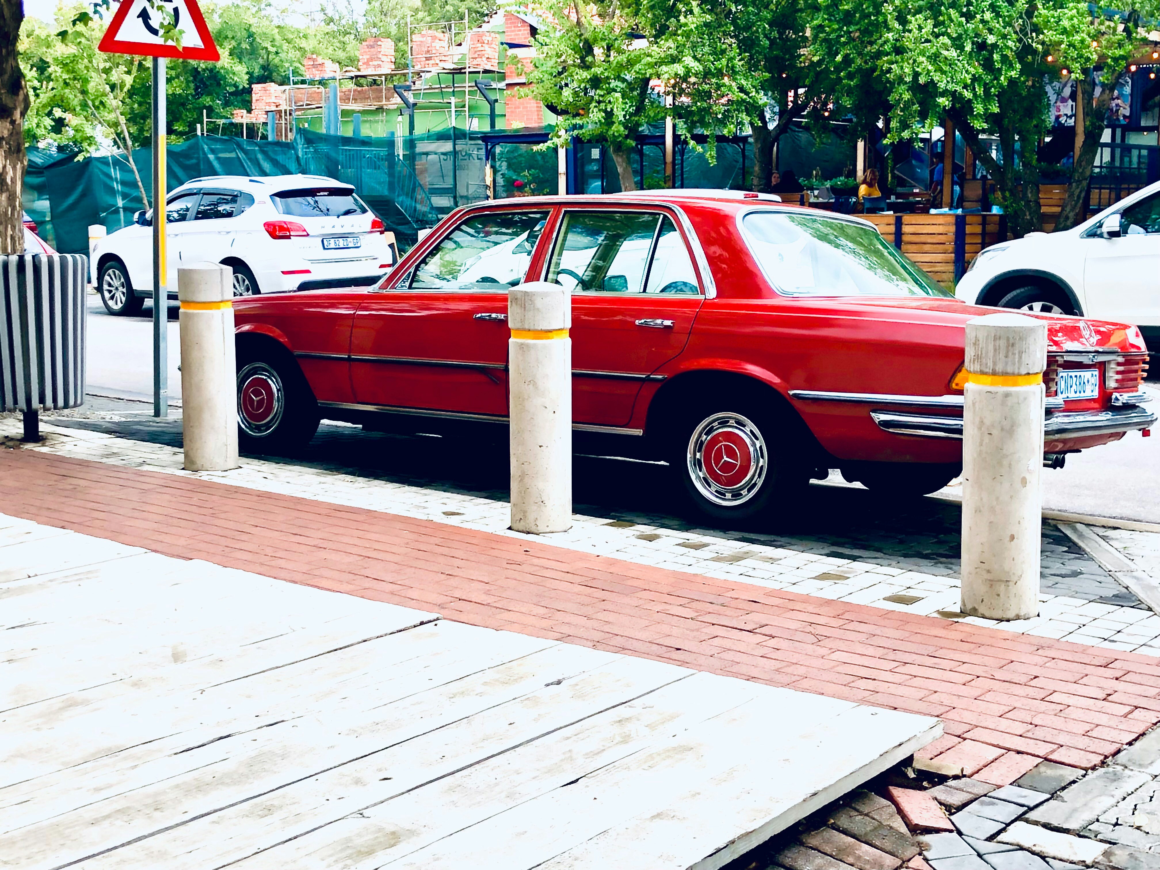 Red hypercar parked, ilustrasi artikel W Motors Lykan Hypersport: Unleash Luxury & Speed with Stunning Wallpapers 1