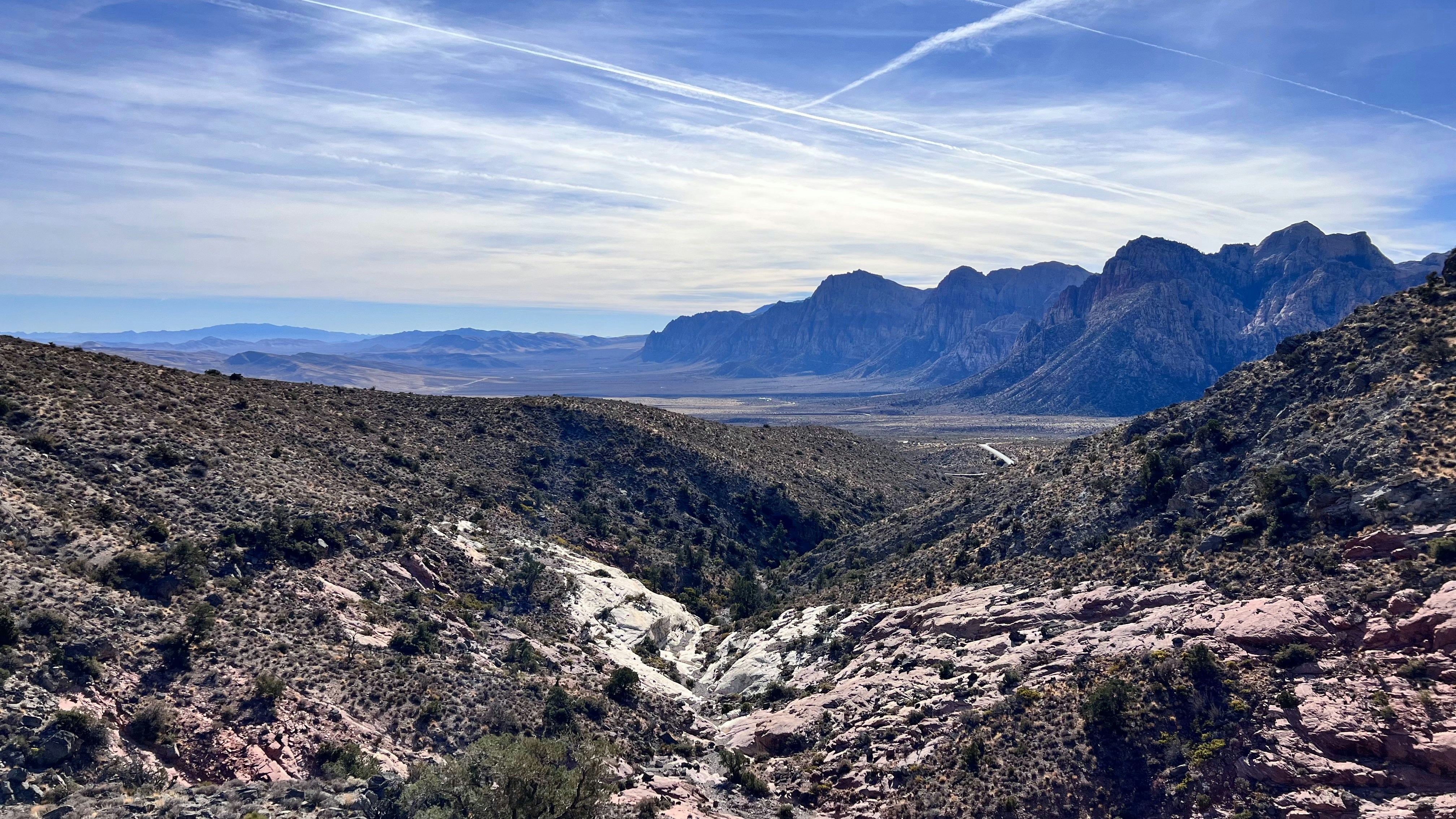 A view of a mountain range from a distance