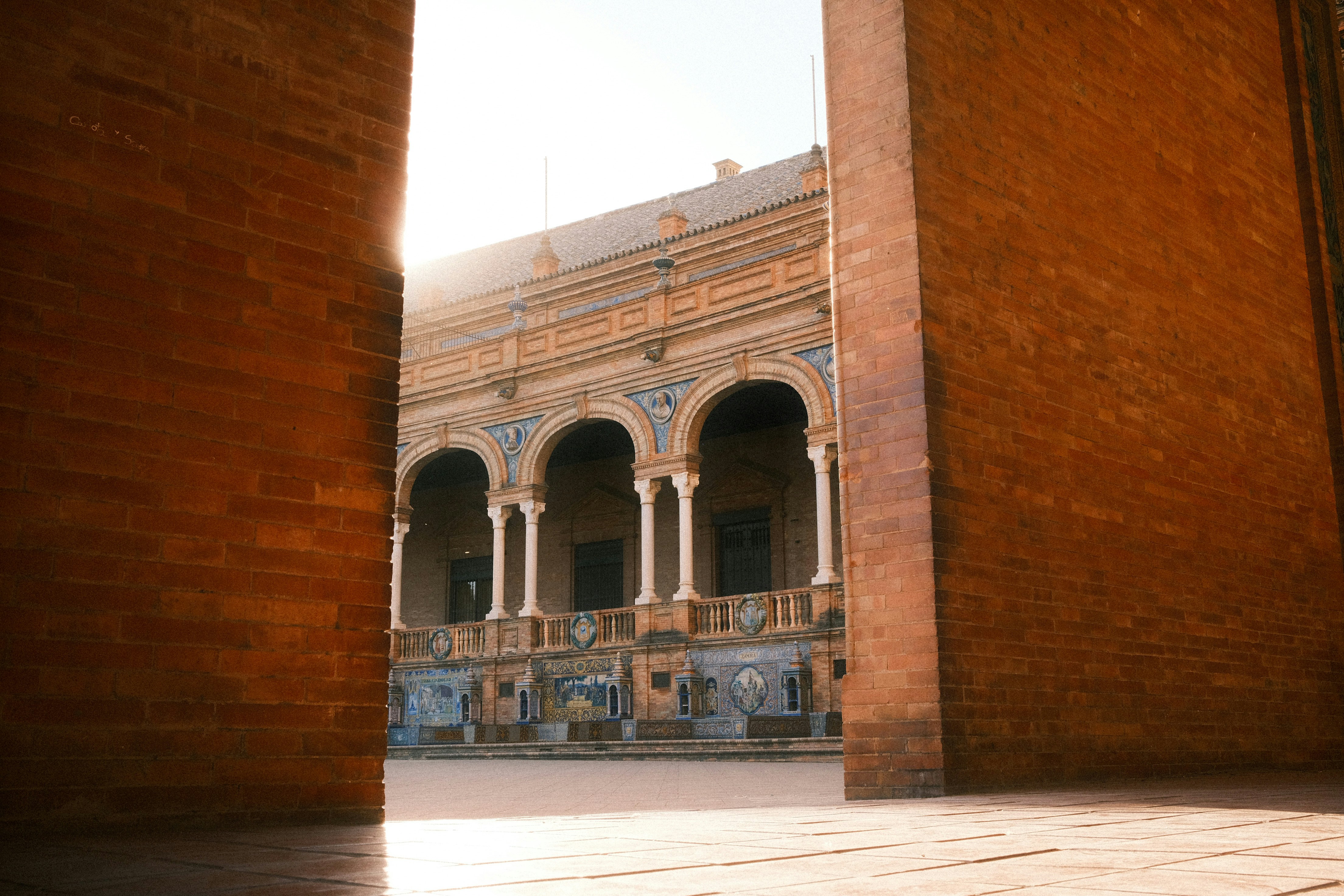 An open doorway leading to a building with columns