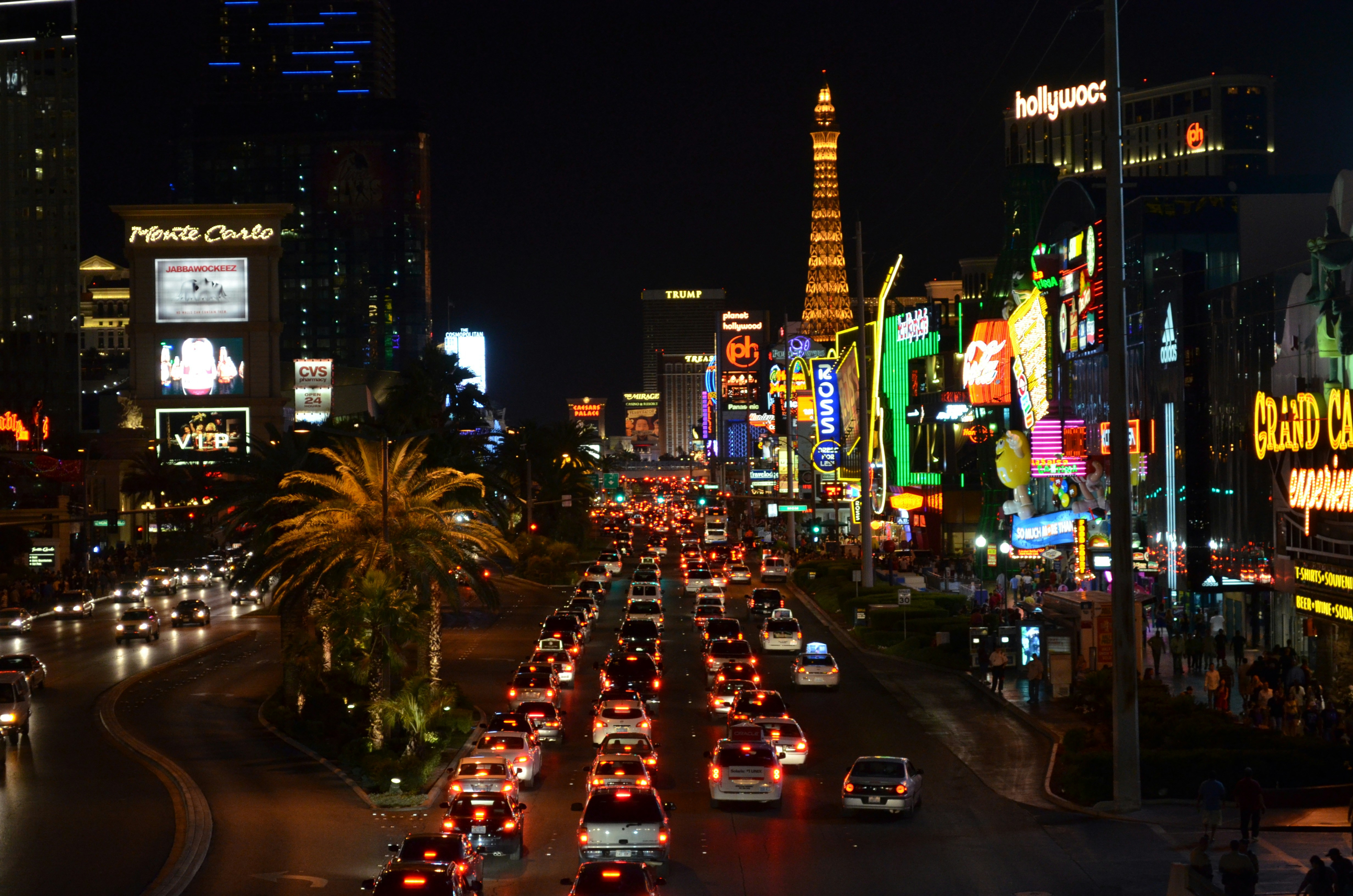 A city street filled with lots of traffic at night photo – Free Night ...
