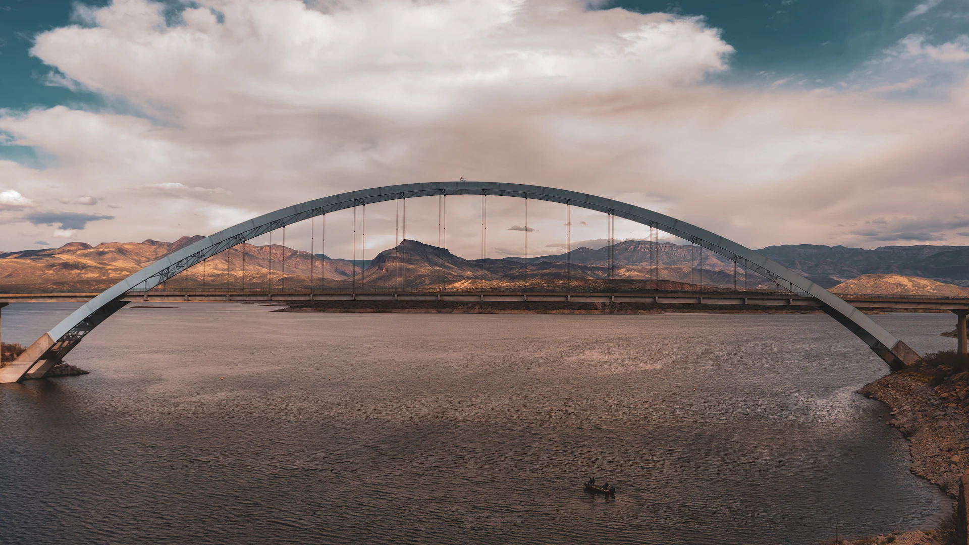 A large bridge over a large body of water