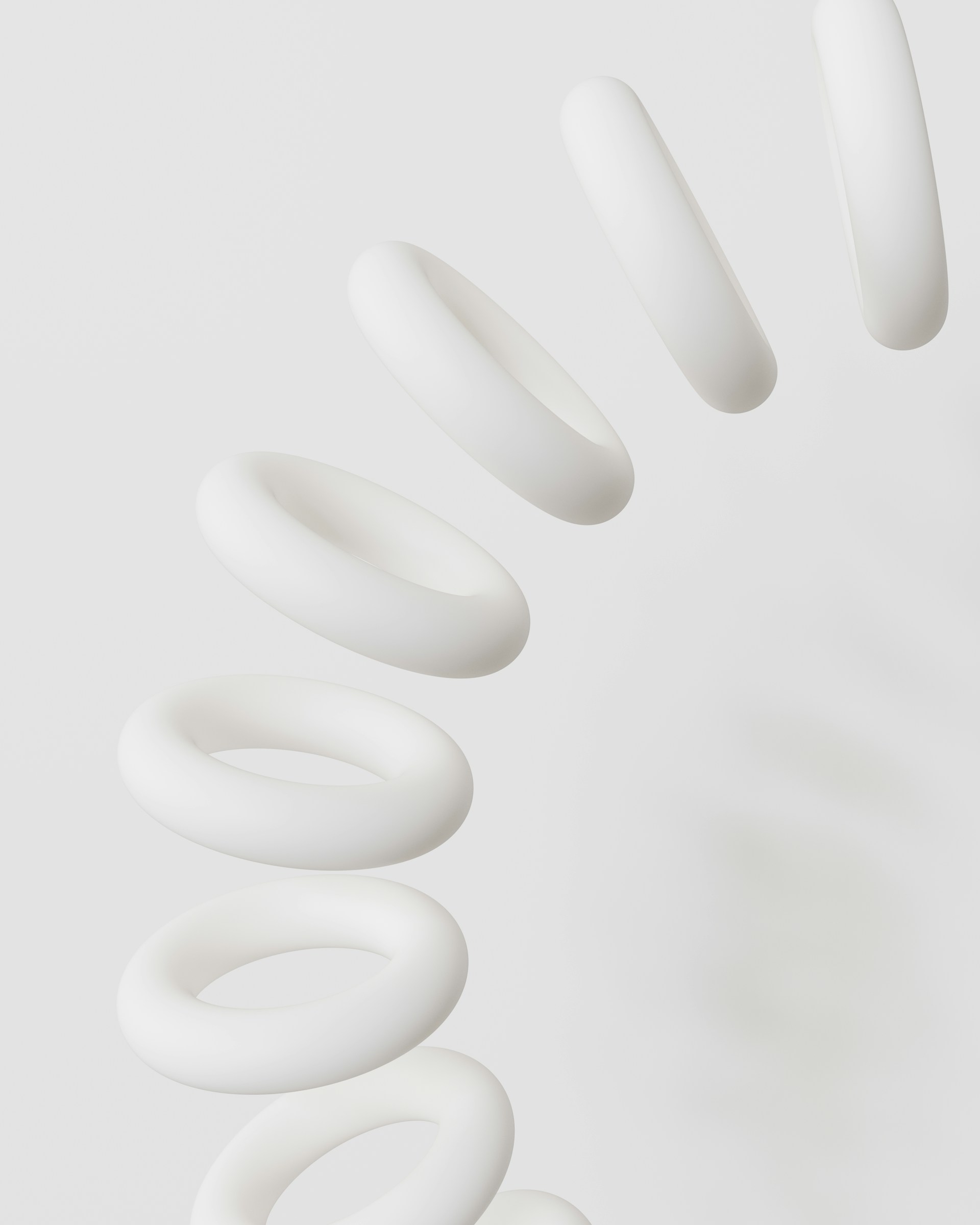A group of white spirals on a white background
