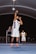 A man in a white uniform is playing basketball