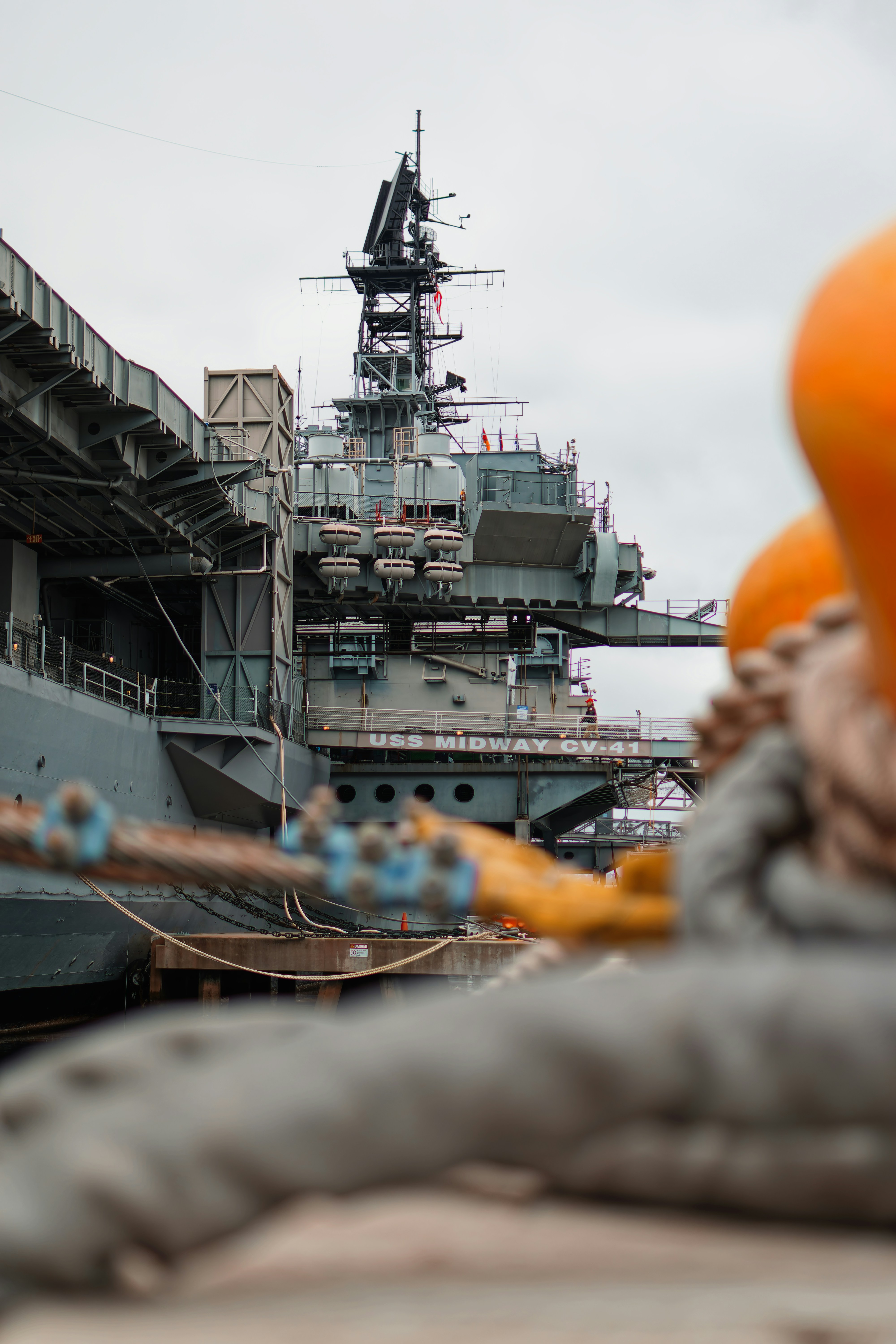 A large ship docked in a large body of water