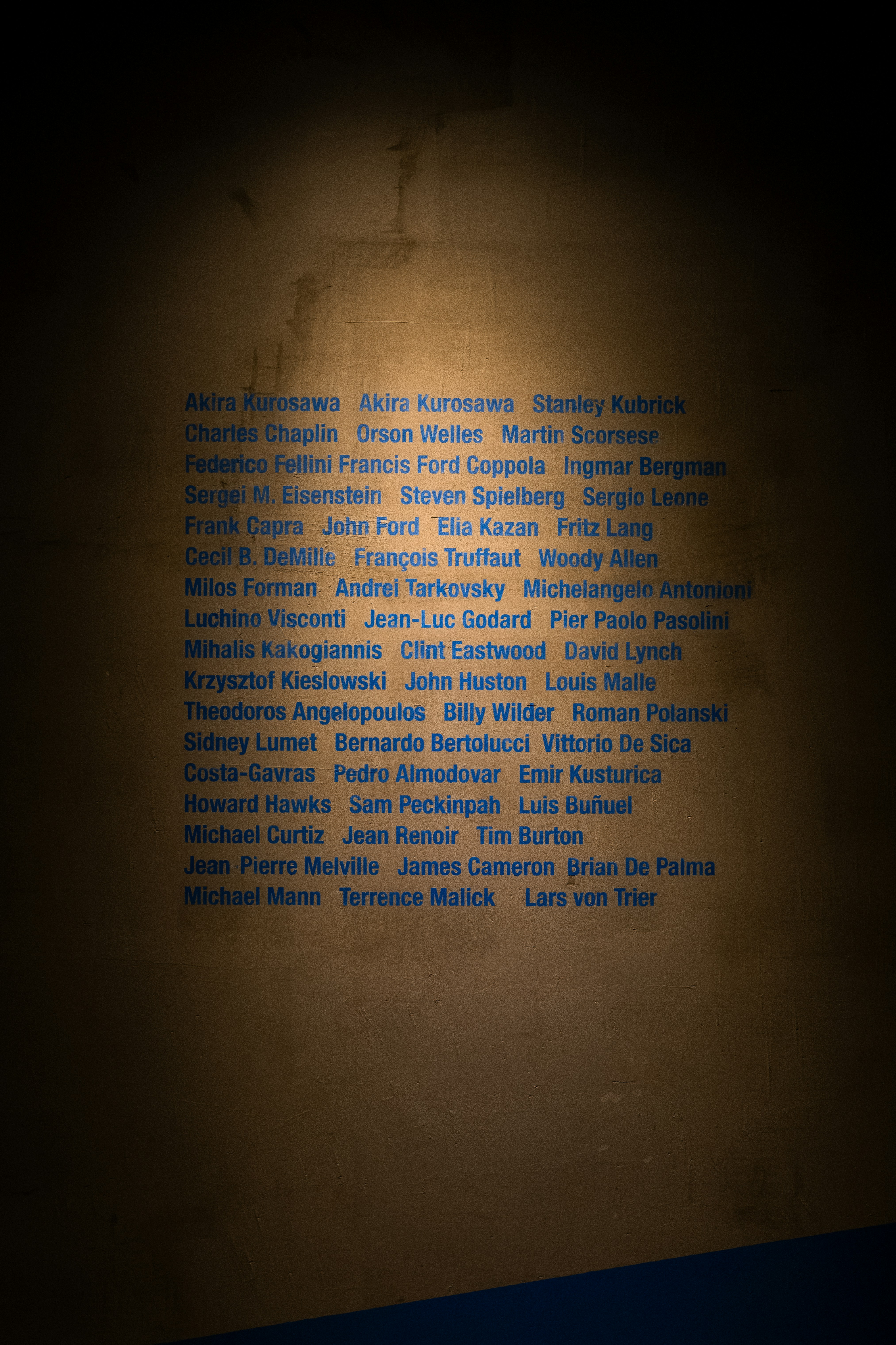 A wall that has some writing on it