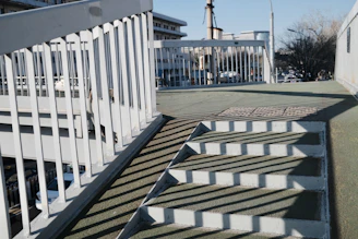 A set of stairs leading up to a building