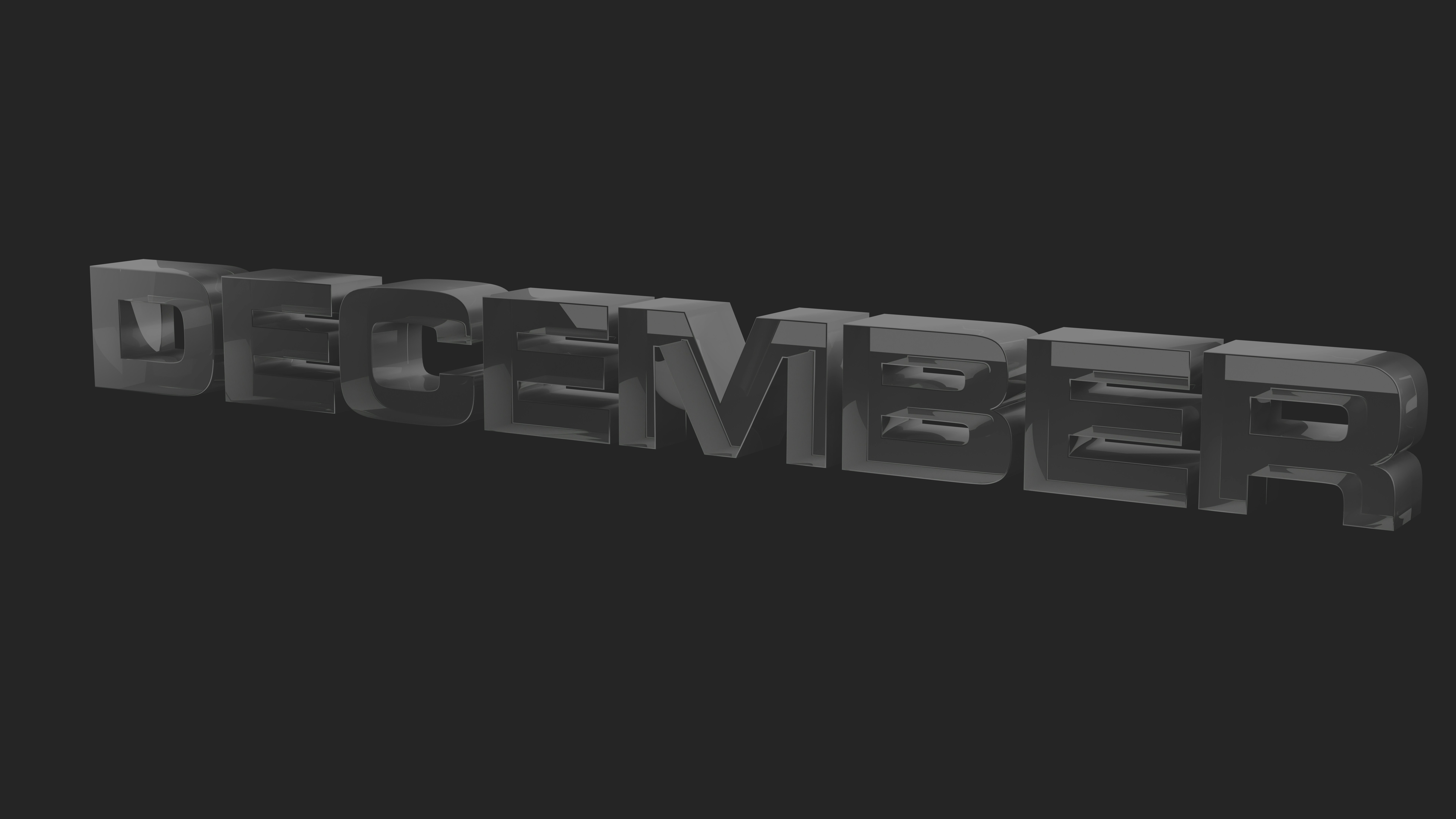 A black and white photo of the word december