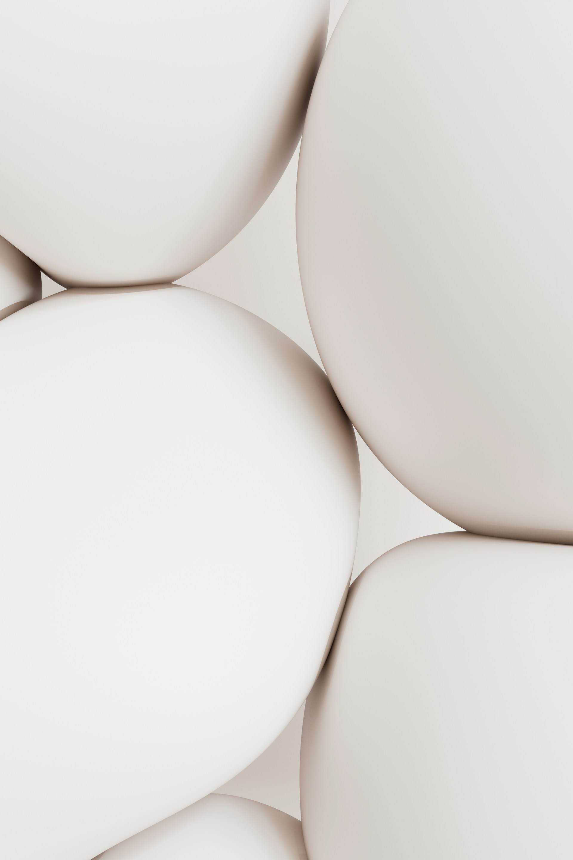 A bunch of white balls sitting on top of each other