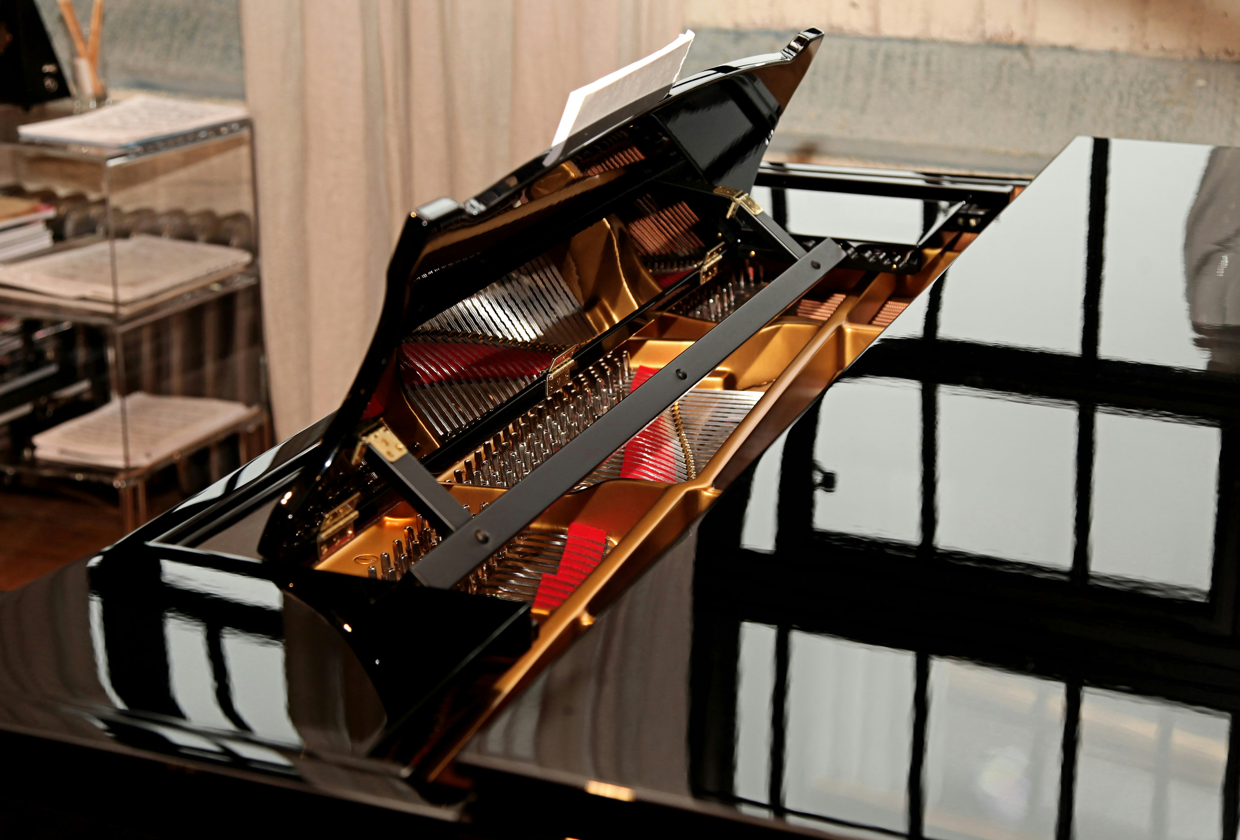 A grand piano sitting in a living room
