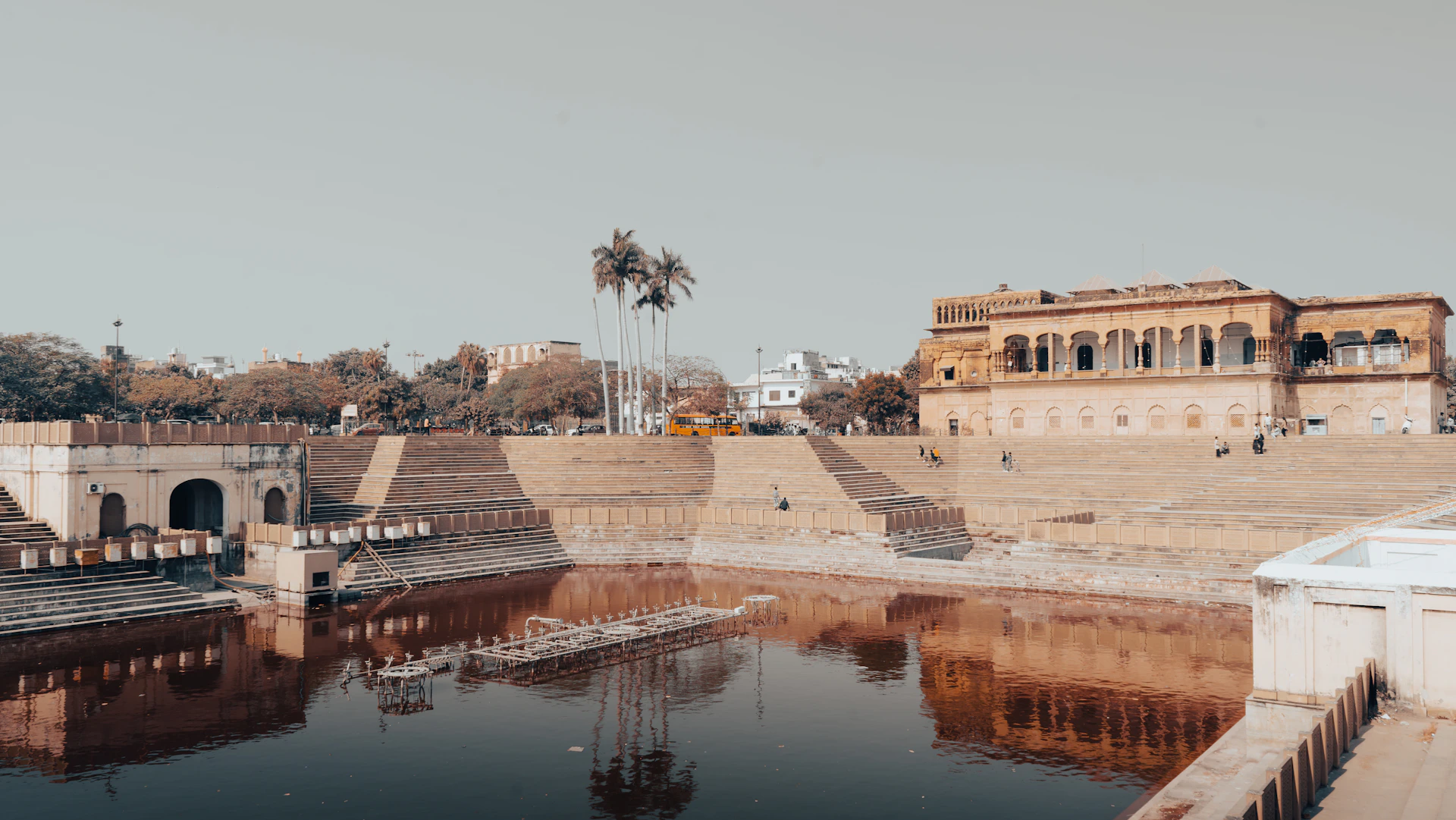 A large body of water next to a building