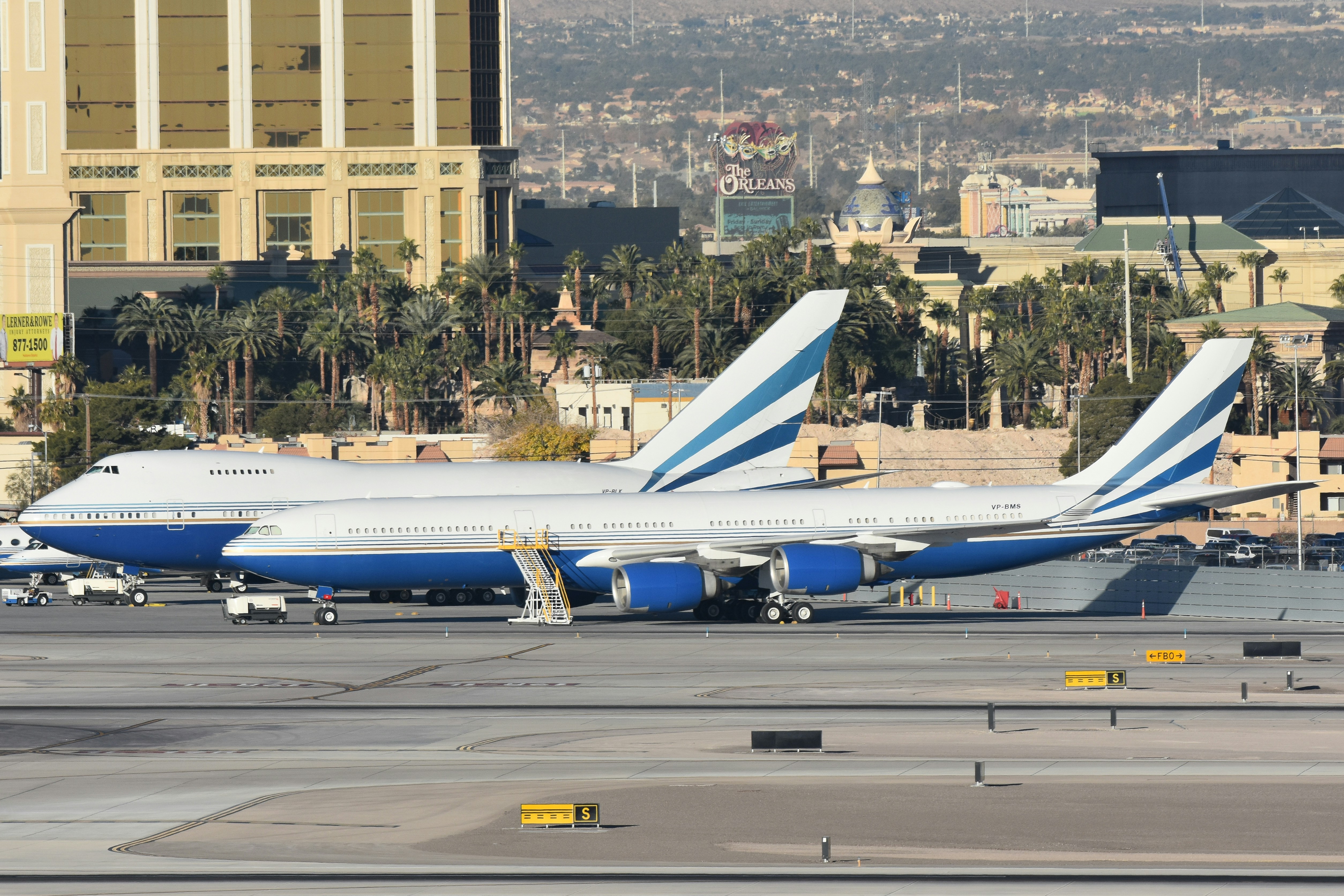 A couple of airplanes that are on a runway