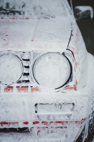 A car is covered in snow and ice