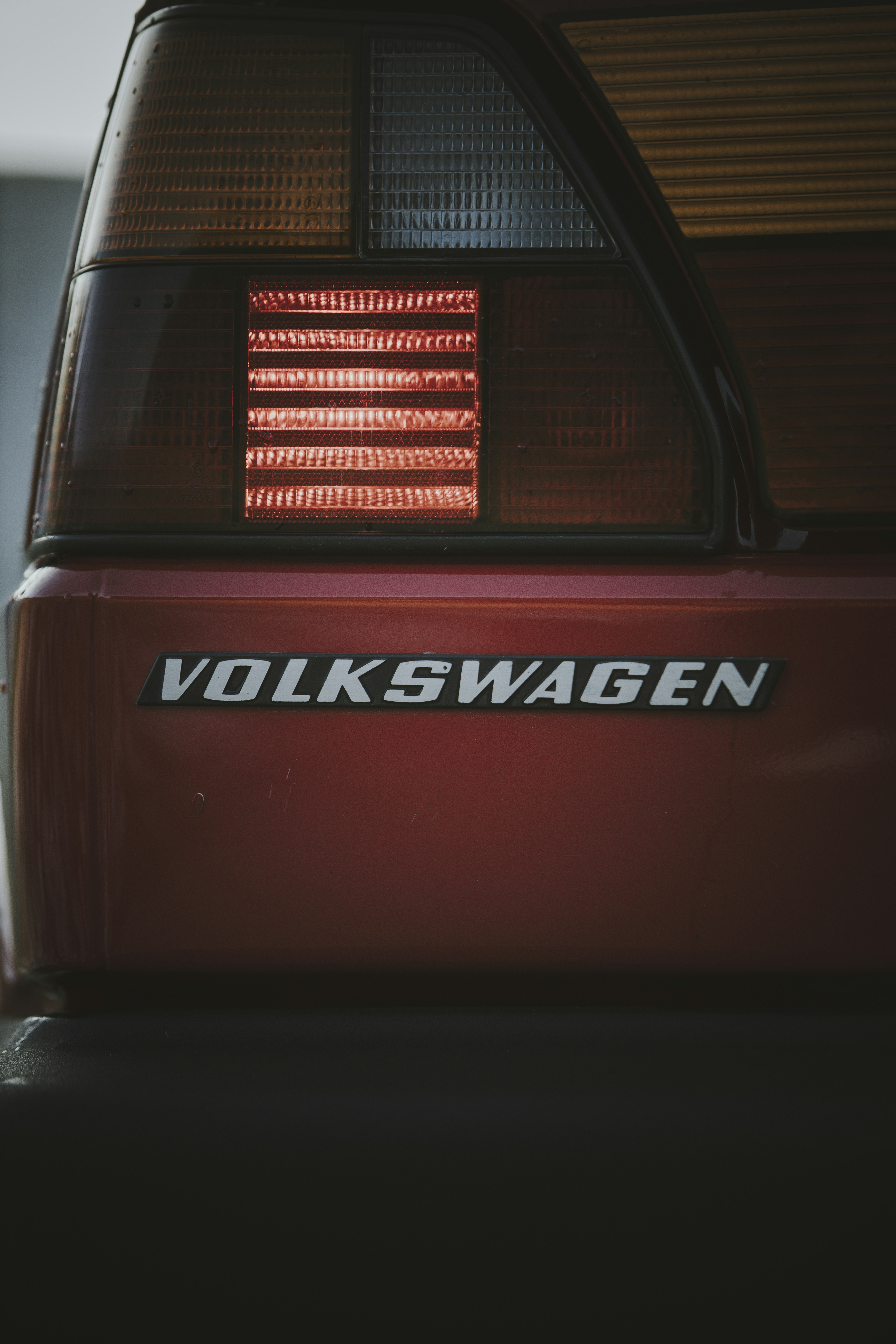 A close up of the tail light of a volkswagen car