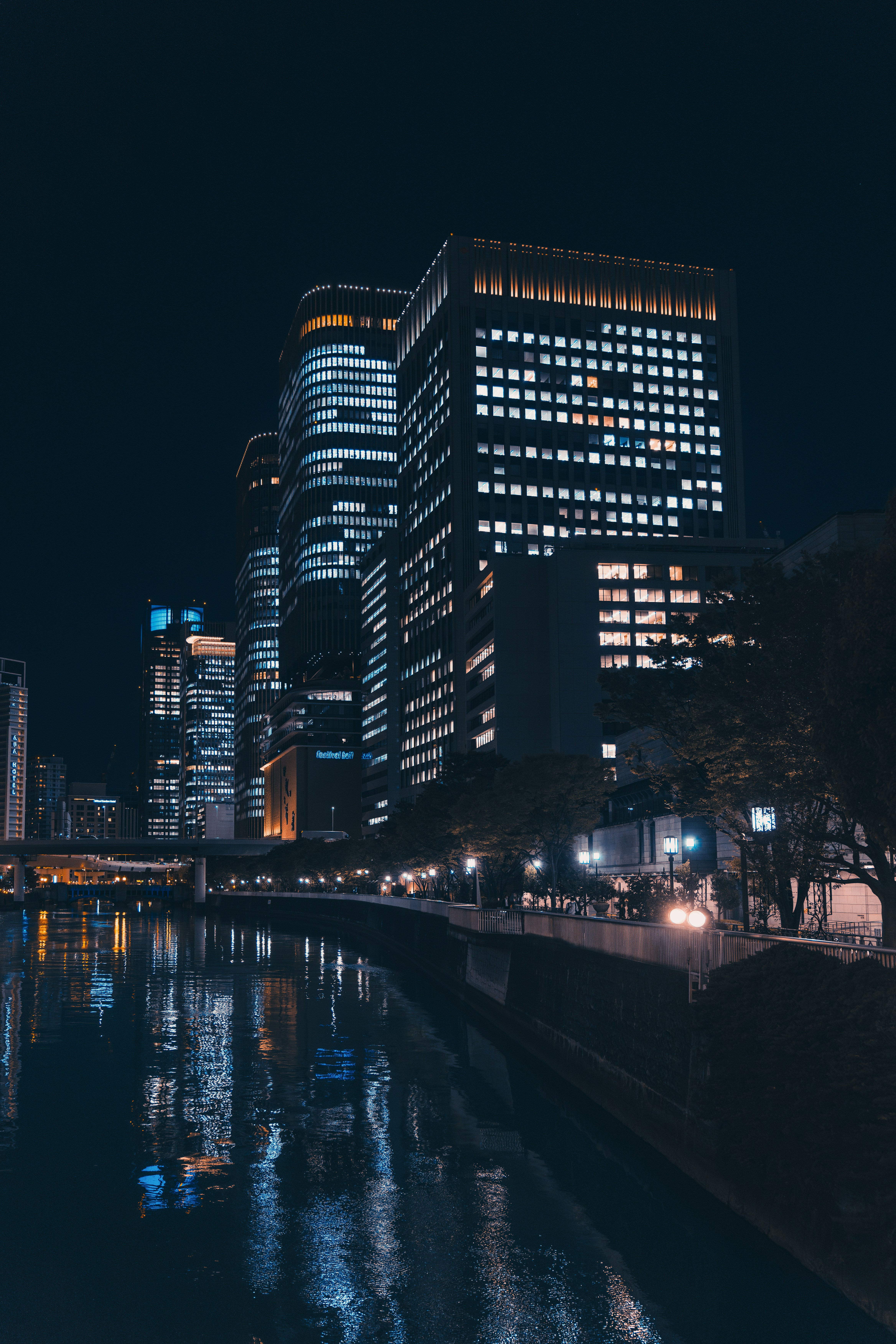 A river running through a city at night