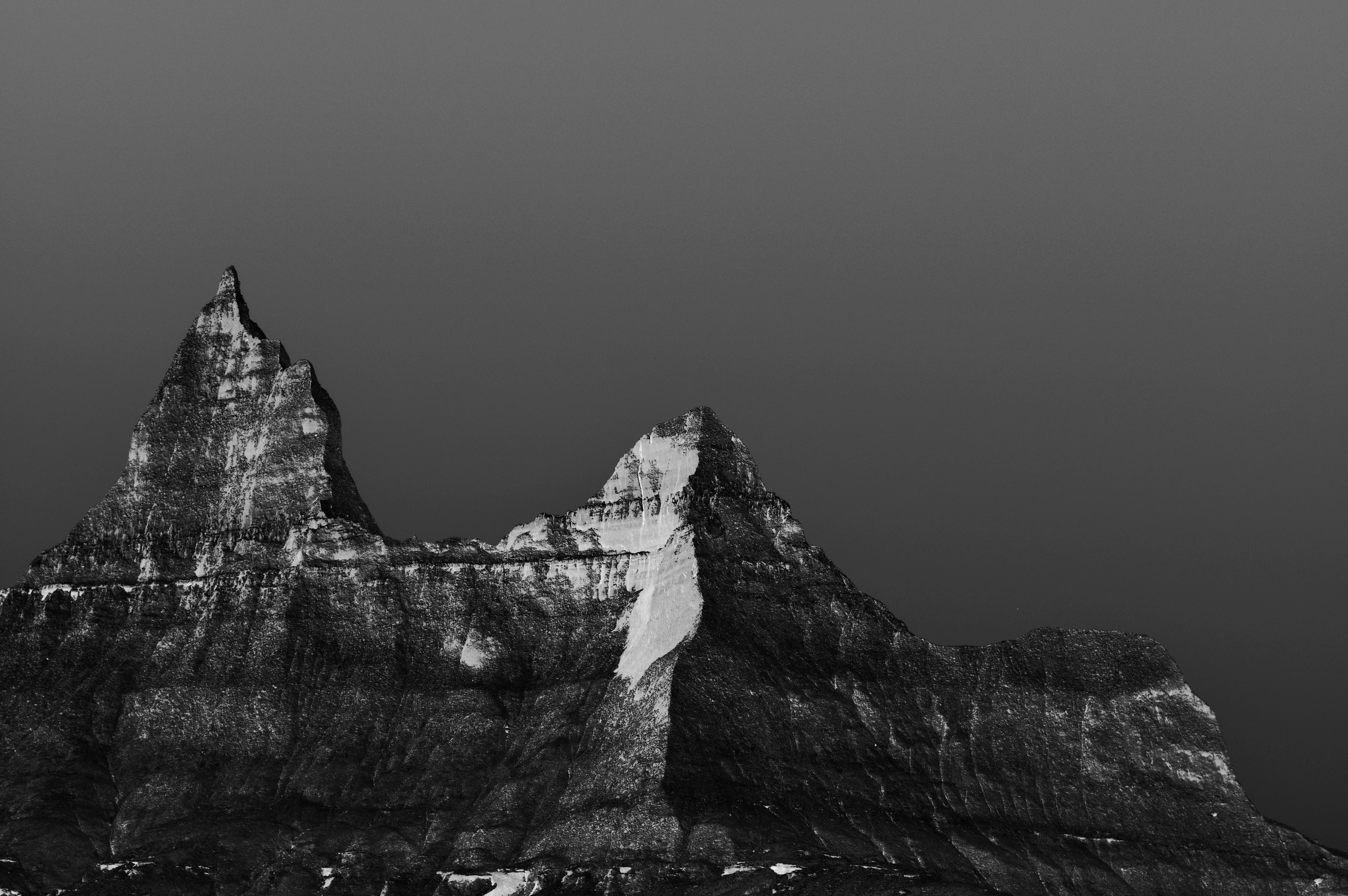 A black and white photo of a mountain