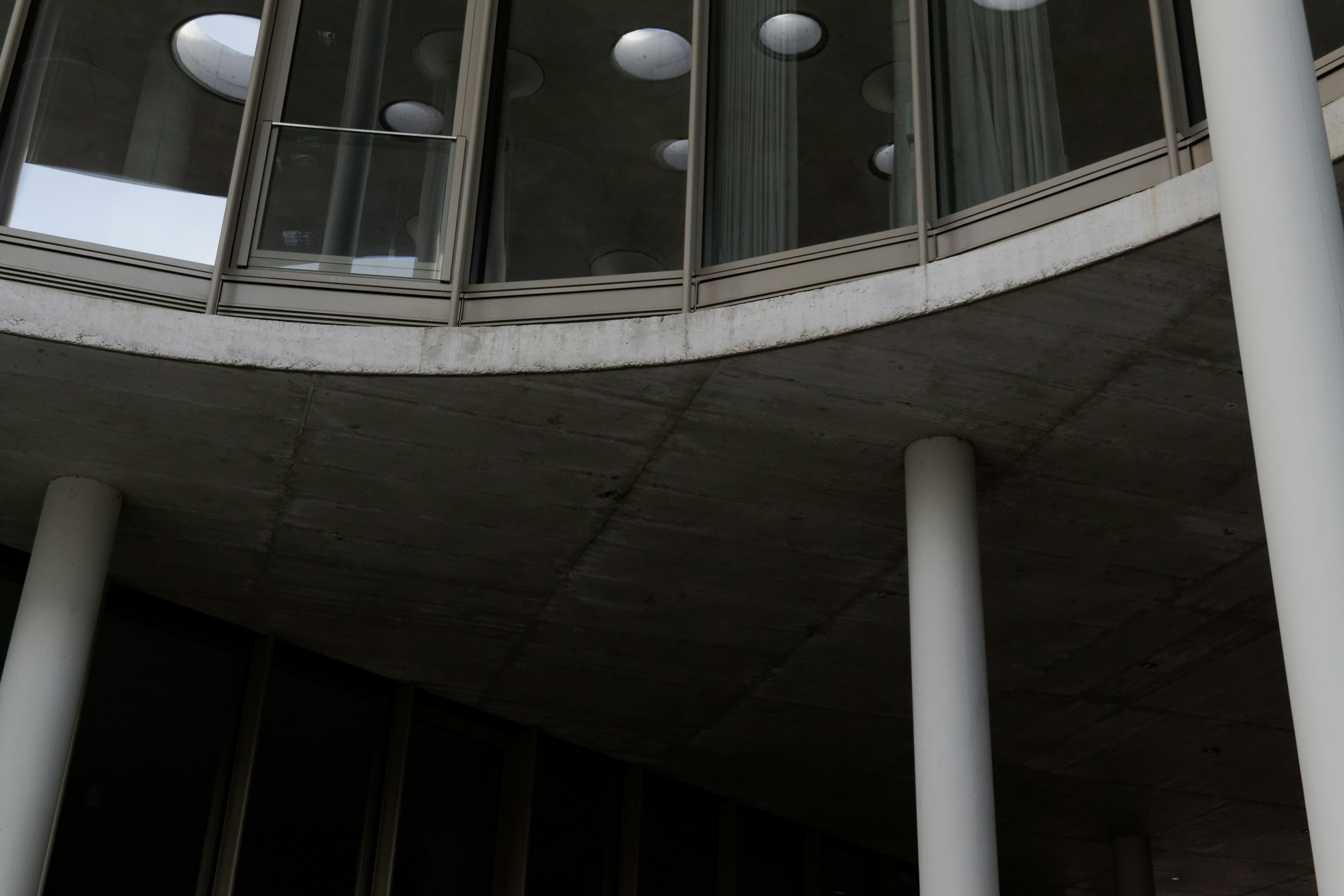 A round building with a balcony and round balconies