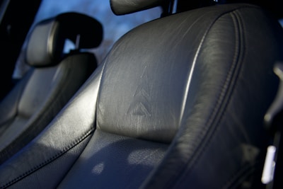 A close up of the front seats of a car