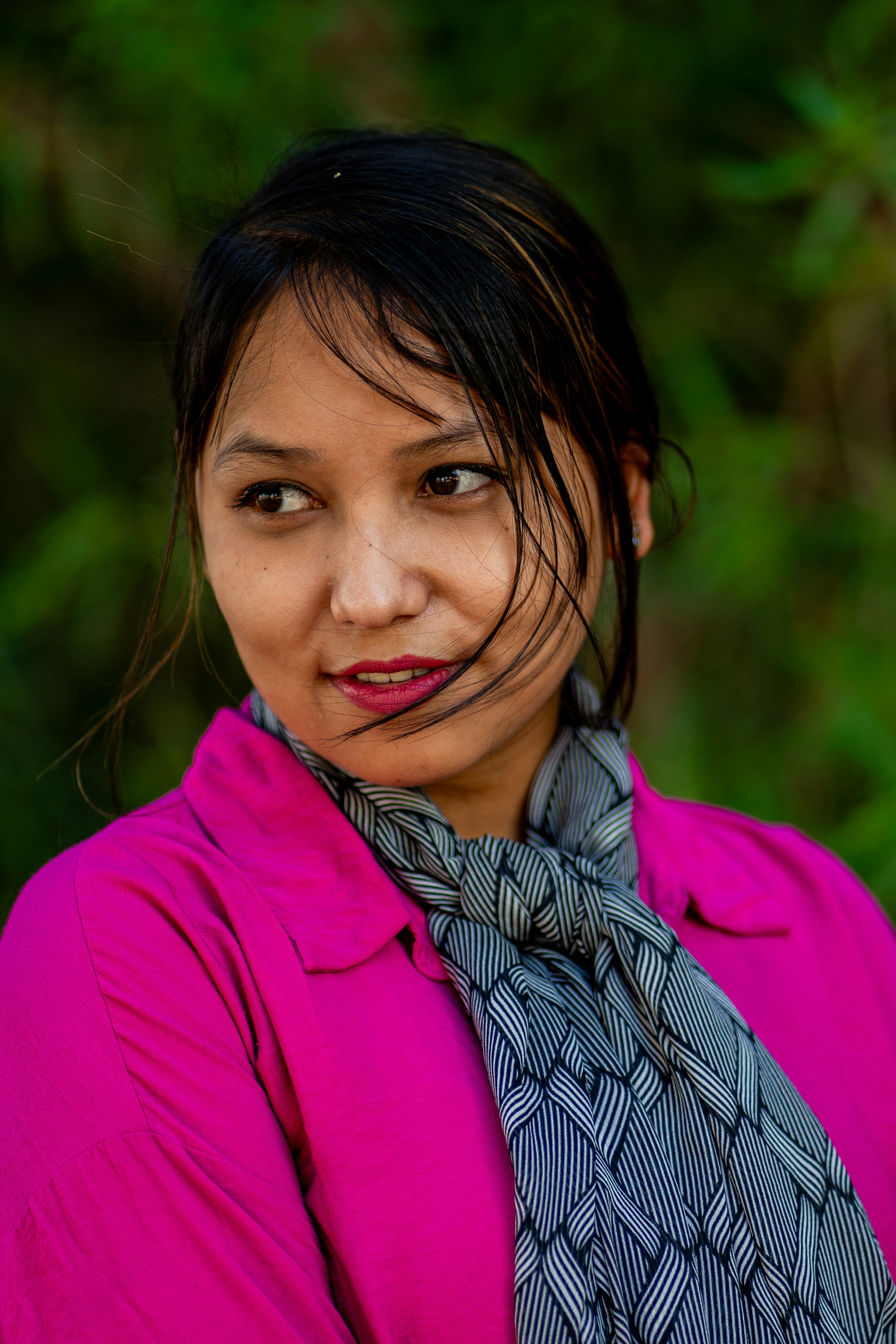 A woman with a scarf around her neck