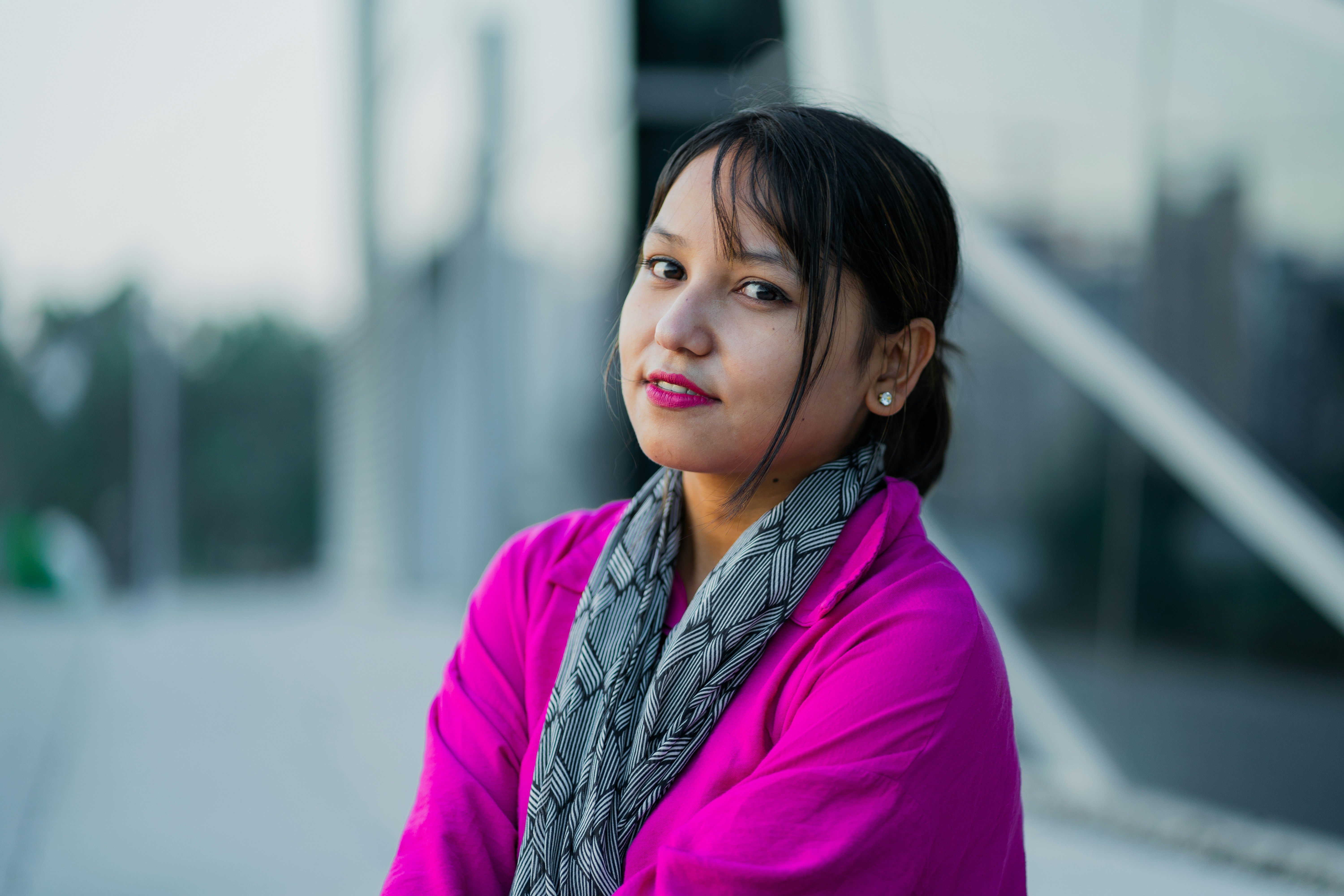 A woman with a scarf around her neck