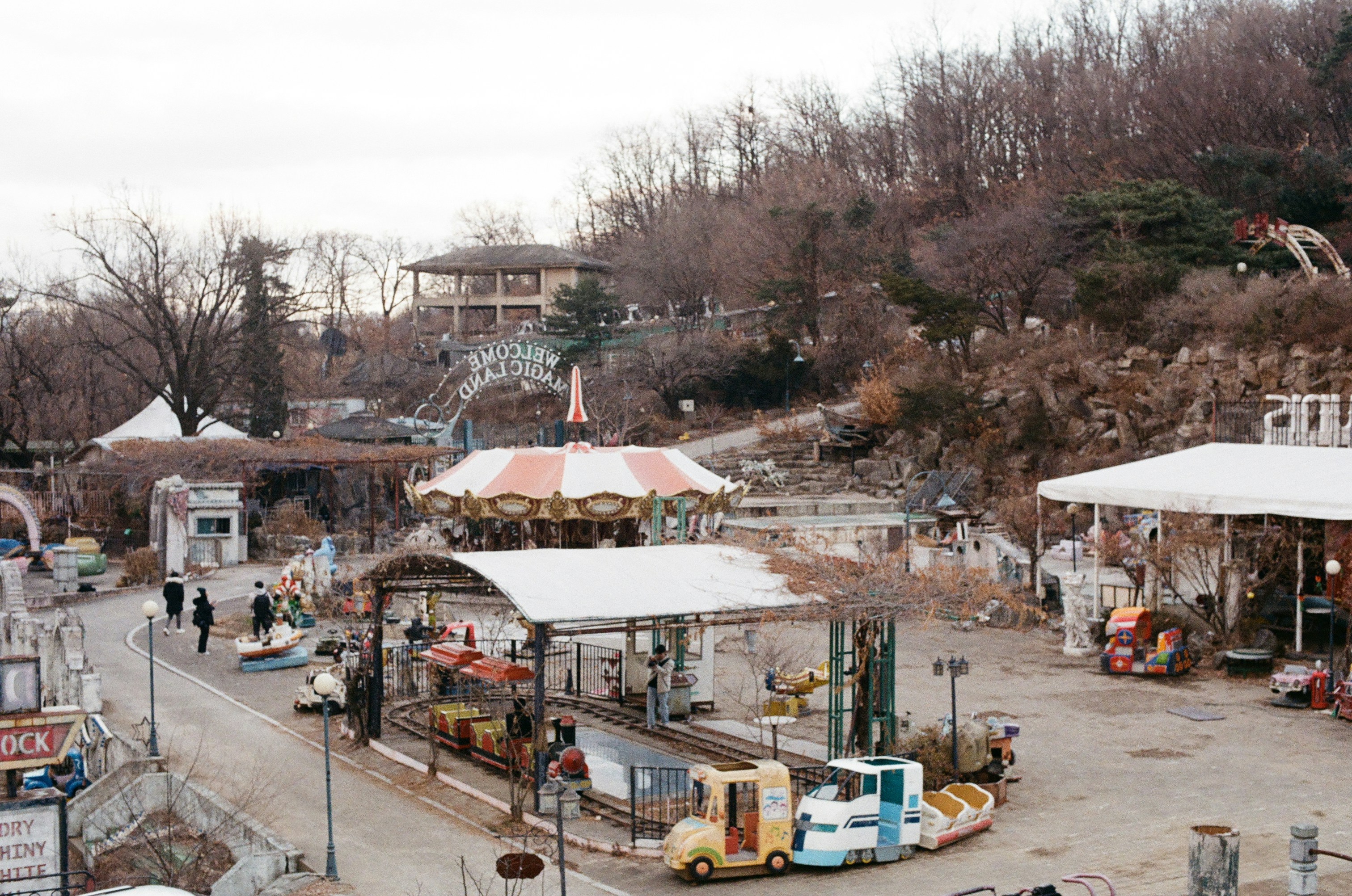 An amusement park with several rides and rides