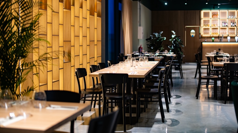 Warm restaurant dining room with tables set for guests