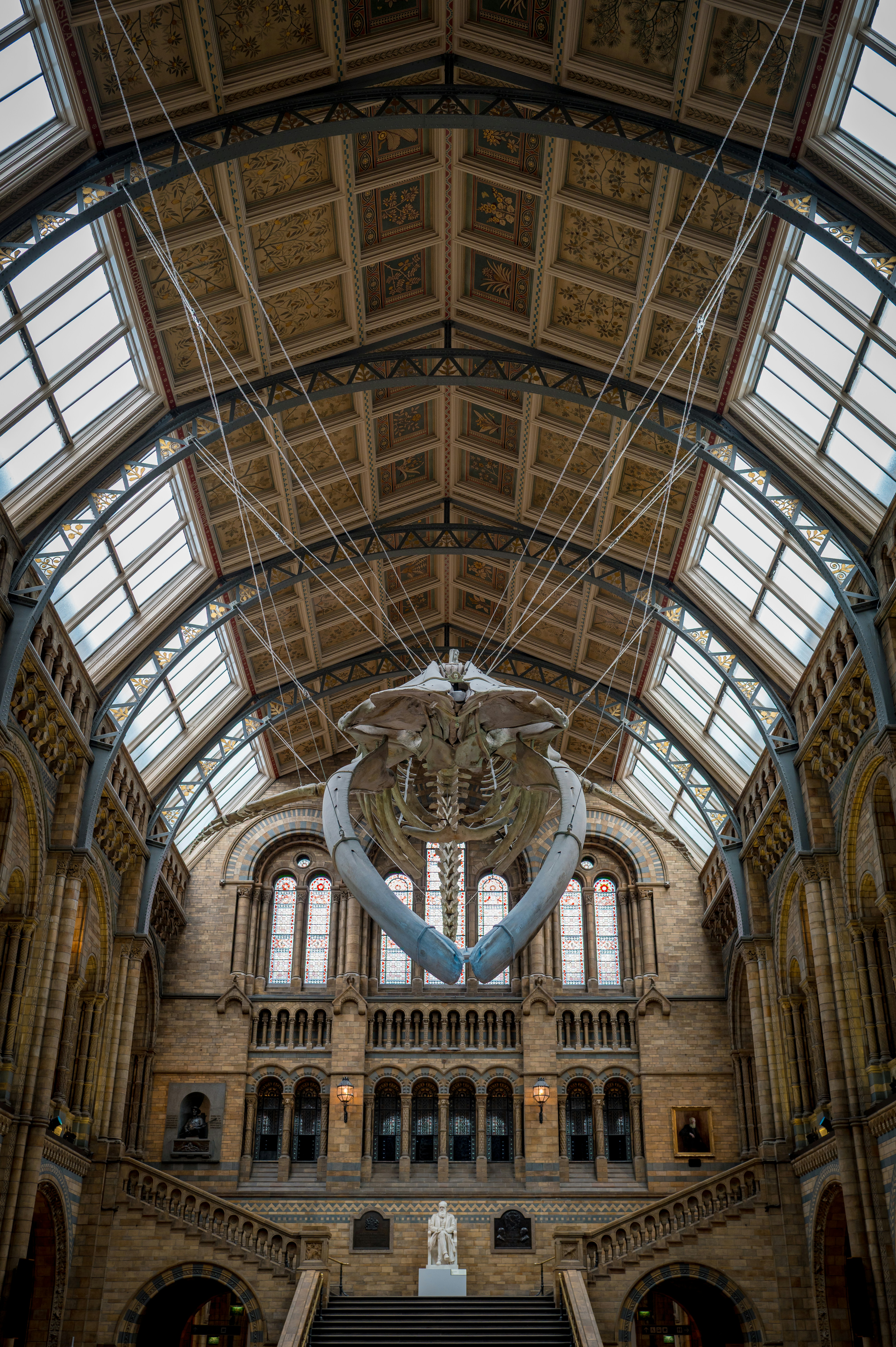 Light-filled interior arches and gallery view inside the Natural History Museum, London, United Kingdom.