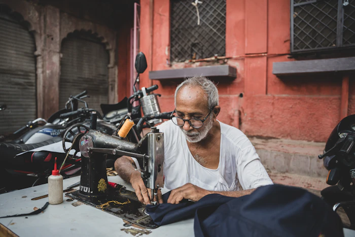 Tailor working at a sewing machine