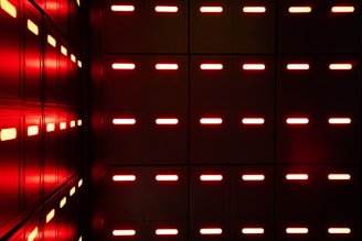 A room with a lot of red lights in it