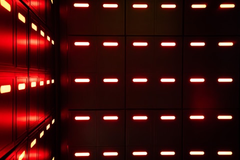 A room with a lot of red lights in it