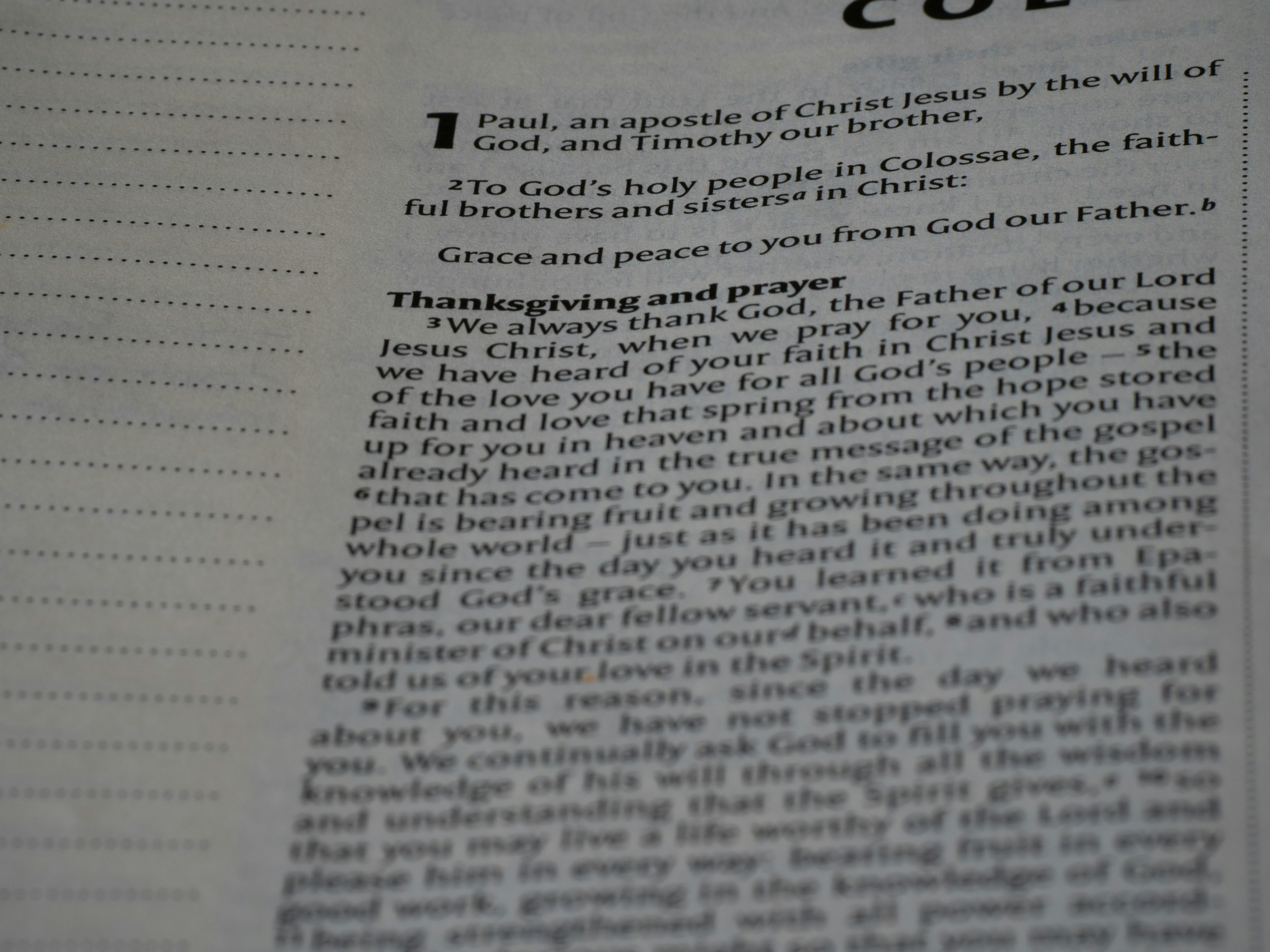 A close up of an open book with text