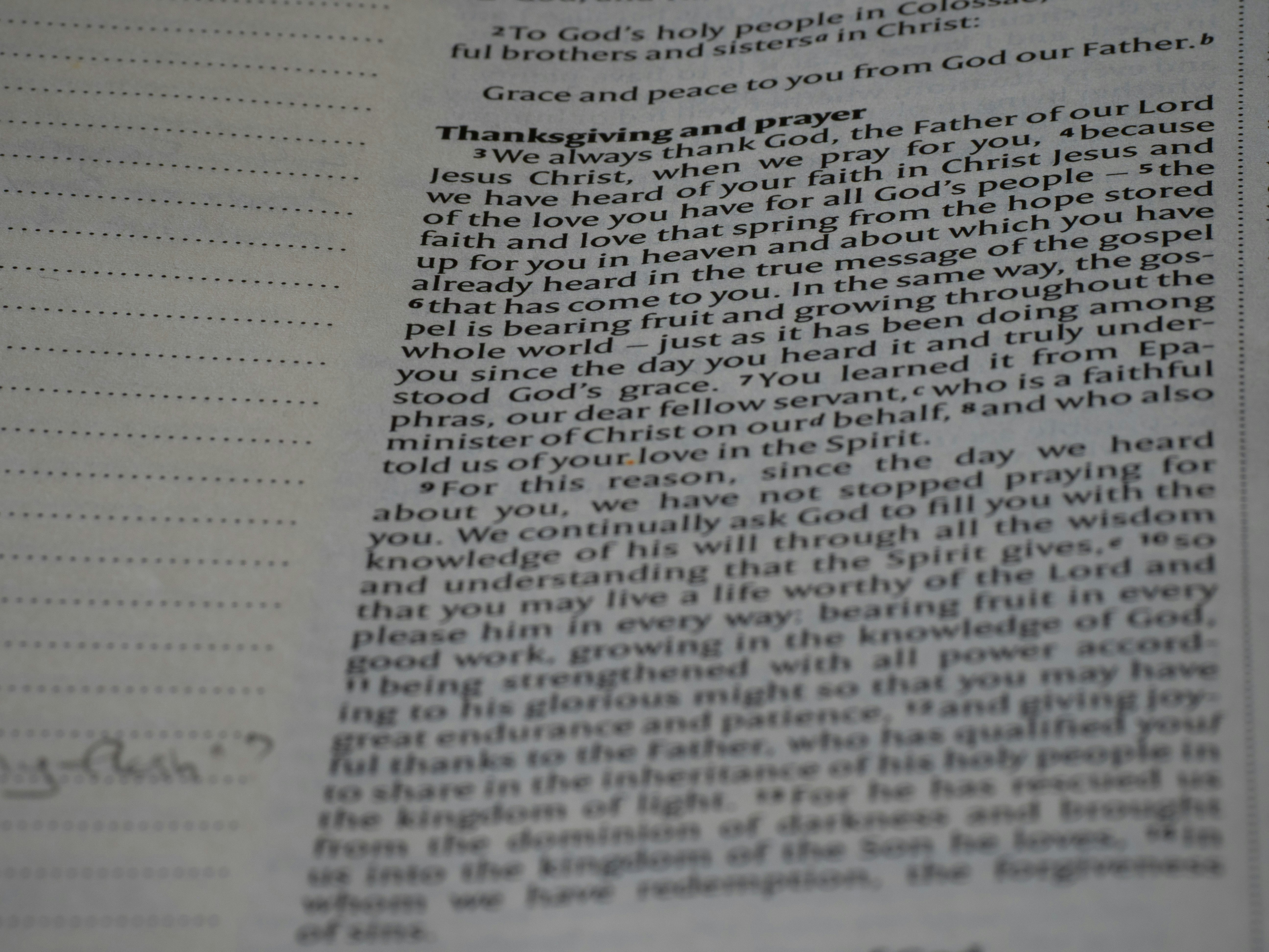 A close up of a book with writing on it