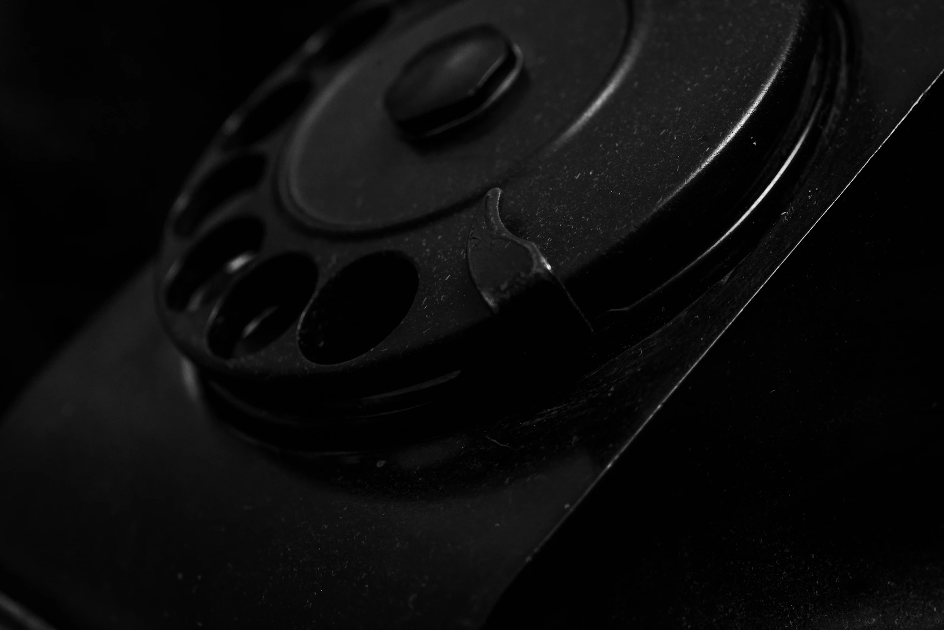 A black and white photo of a remote control