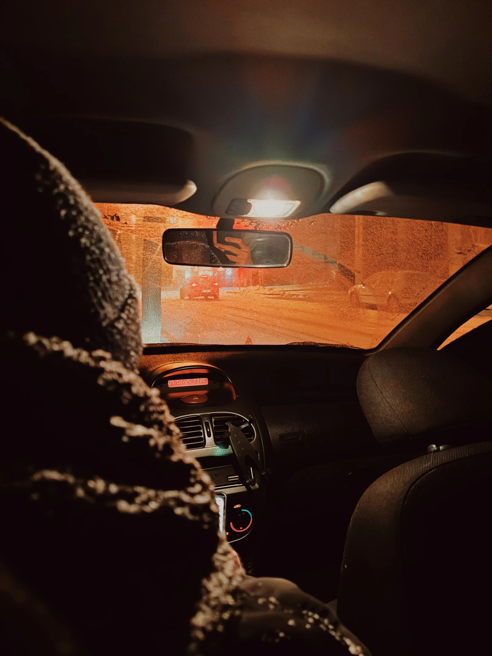 Passenger seated inside a comfortable vehicle interior