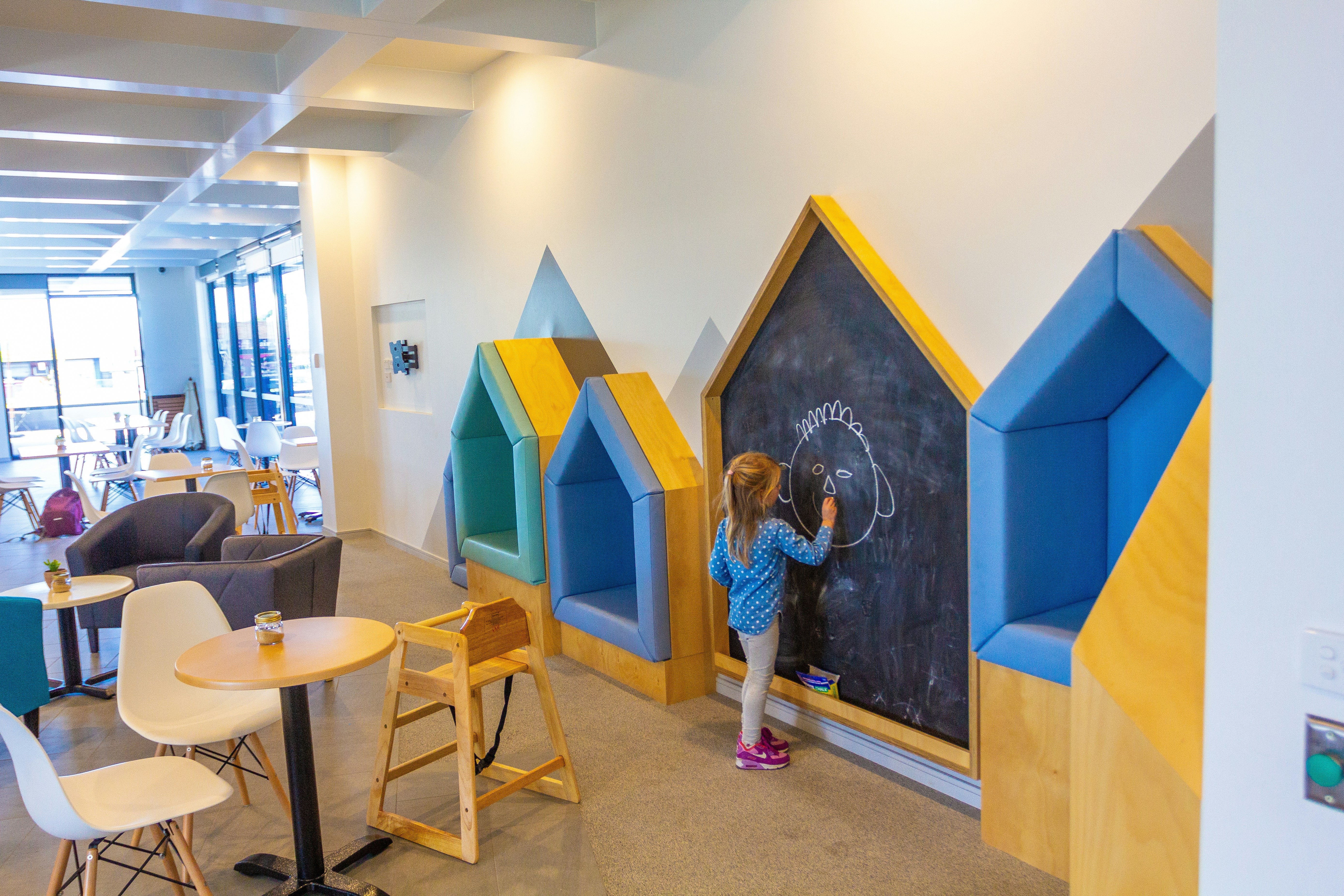 Creative small indoor play space with climbing wall