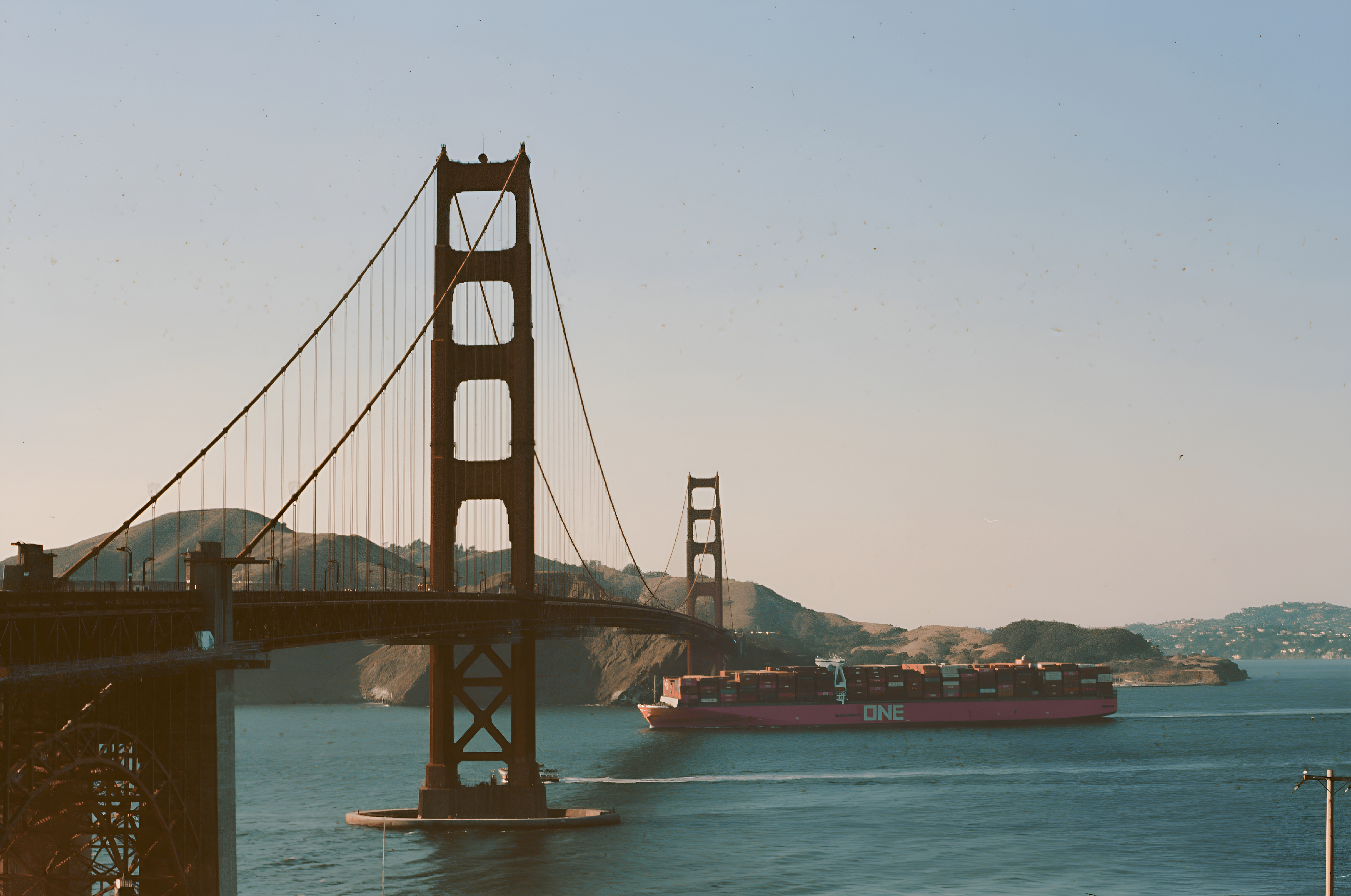 A large bridge spanning over a large body of water